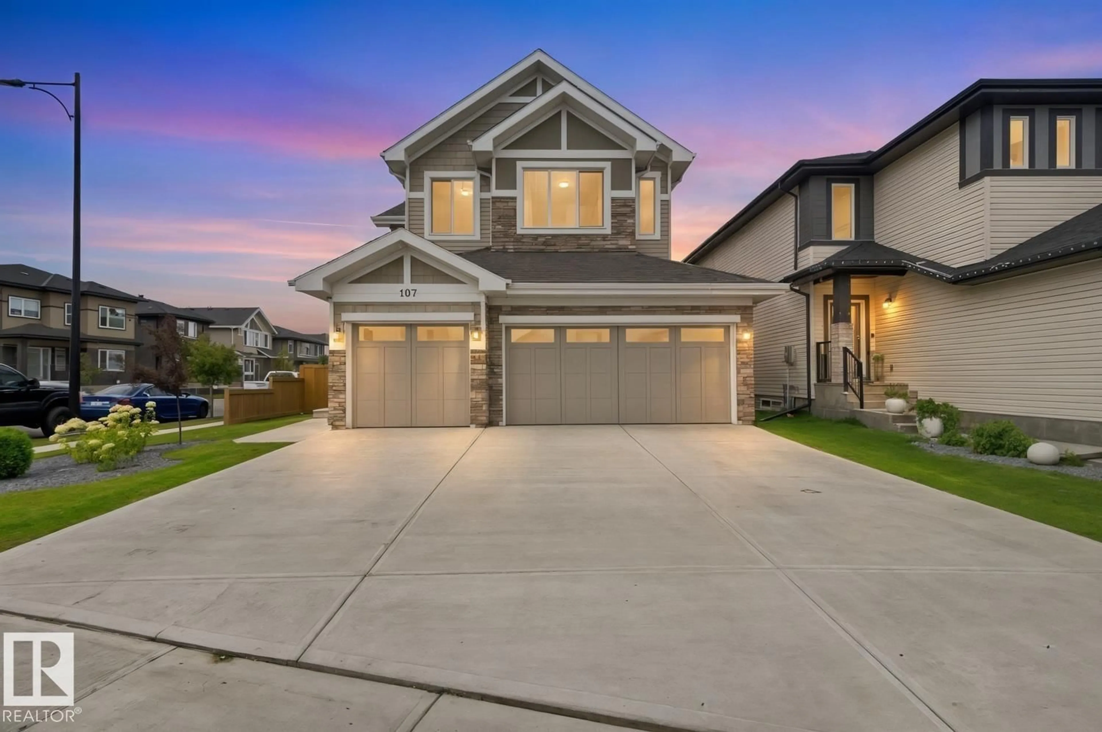 Home with vinyl exterior material, street for 107 ELLICE BN, Fort Saskatchewan Alberta T8L0V2