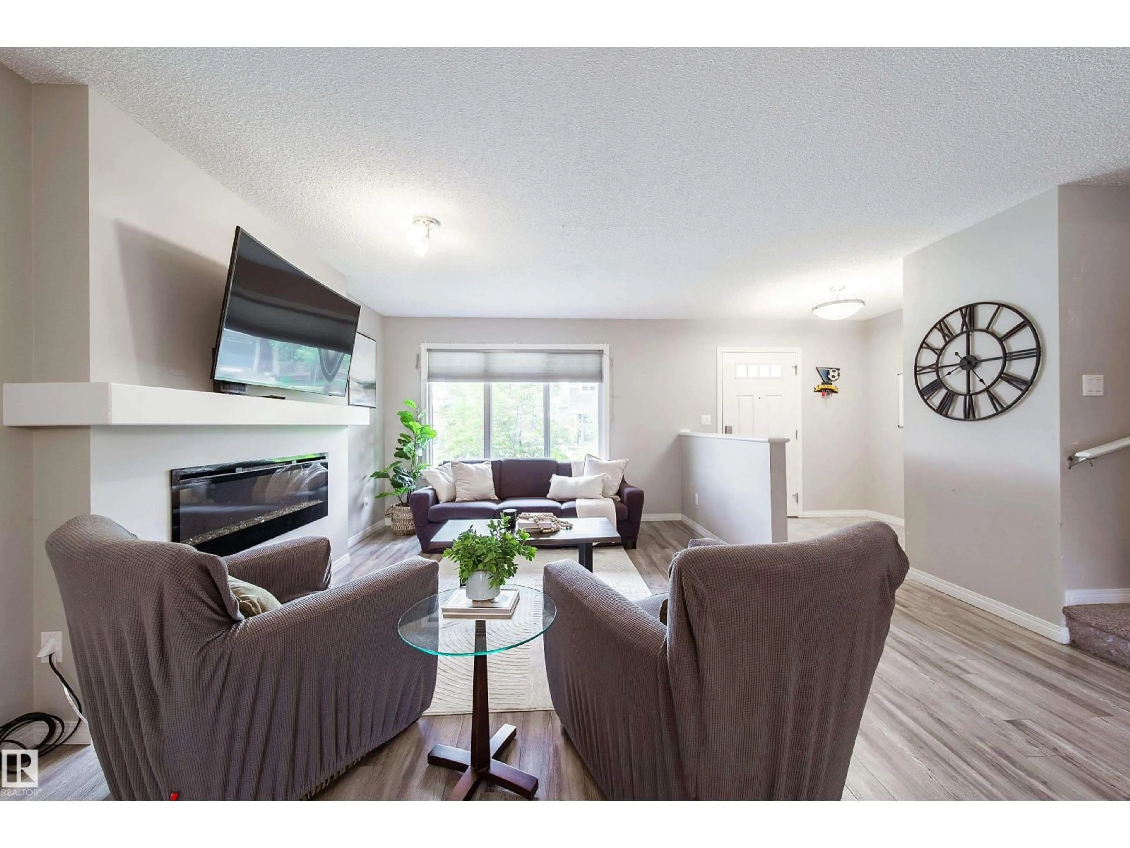 Living room with furniture, wood/laminate floor for SW - 3211 CHERRY CR, Edmonton Alberta T6X1Y5