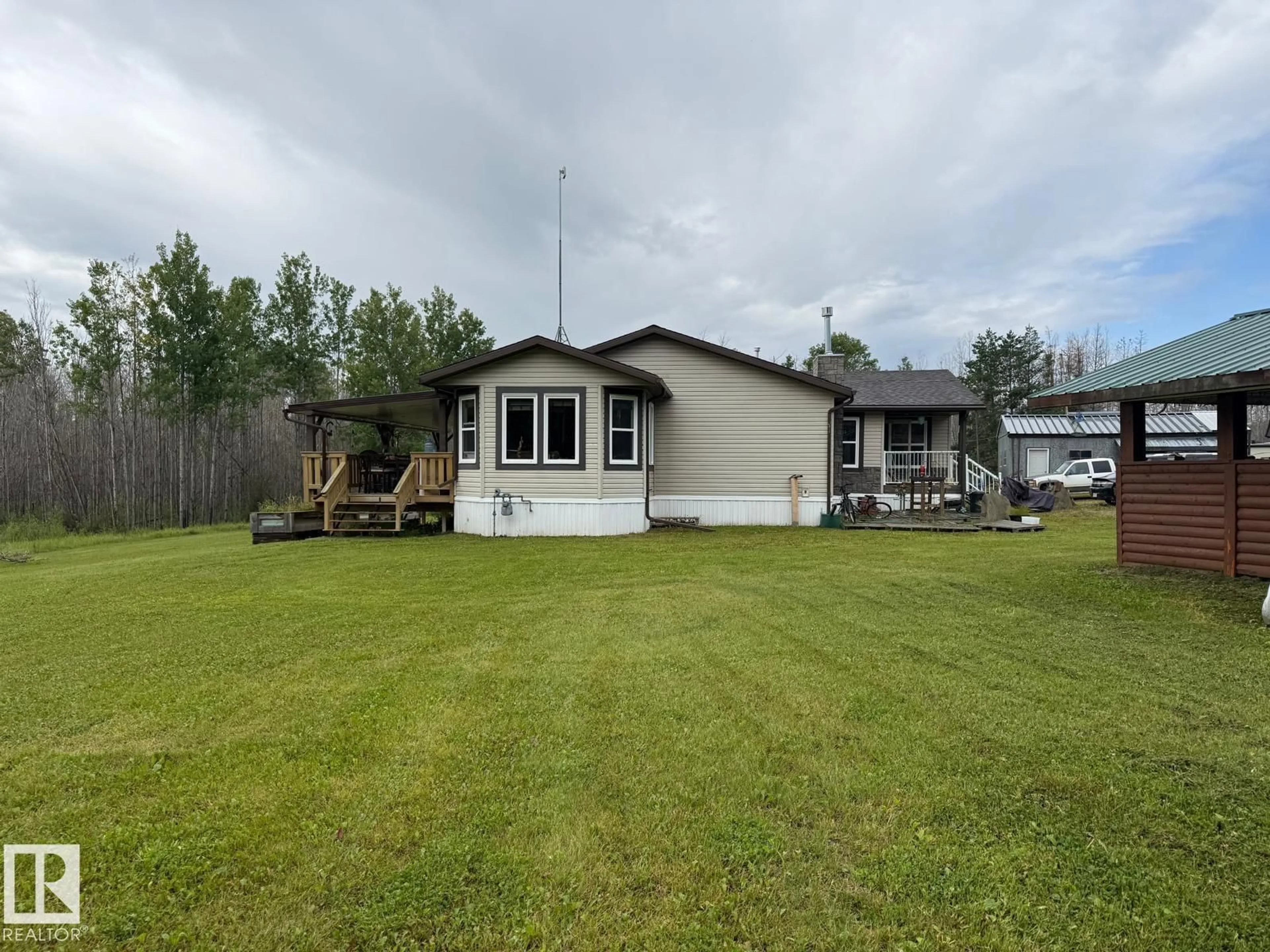 A pic from outside/outdoor area/front of a property/back of a property/a pic from drone, water/lake/river/ocean view for 56509 HWY 32, Rural Yellowhead Alberta T7E3X8