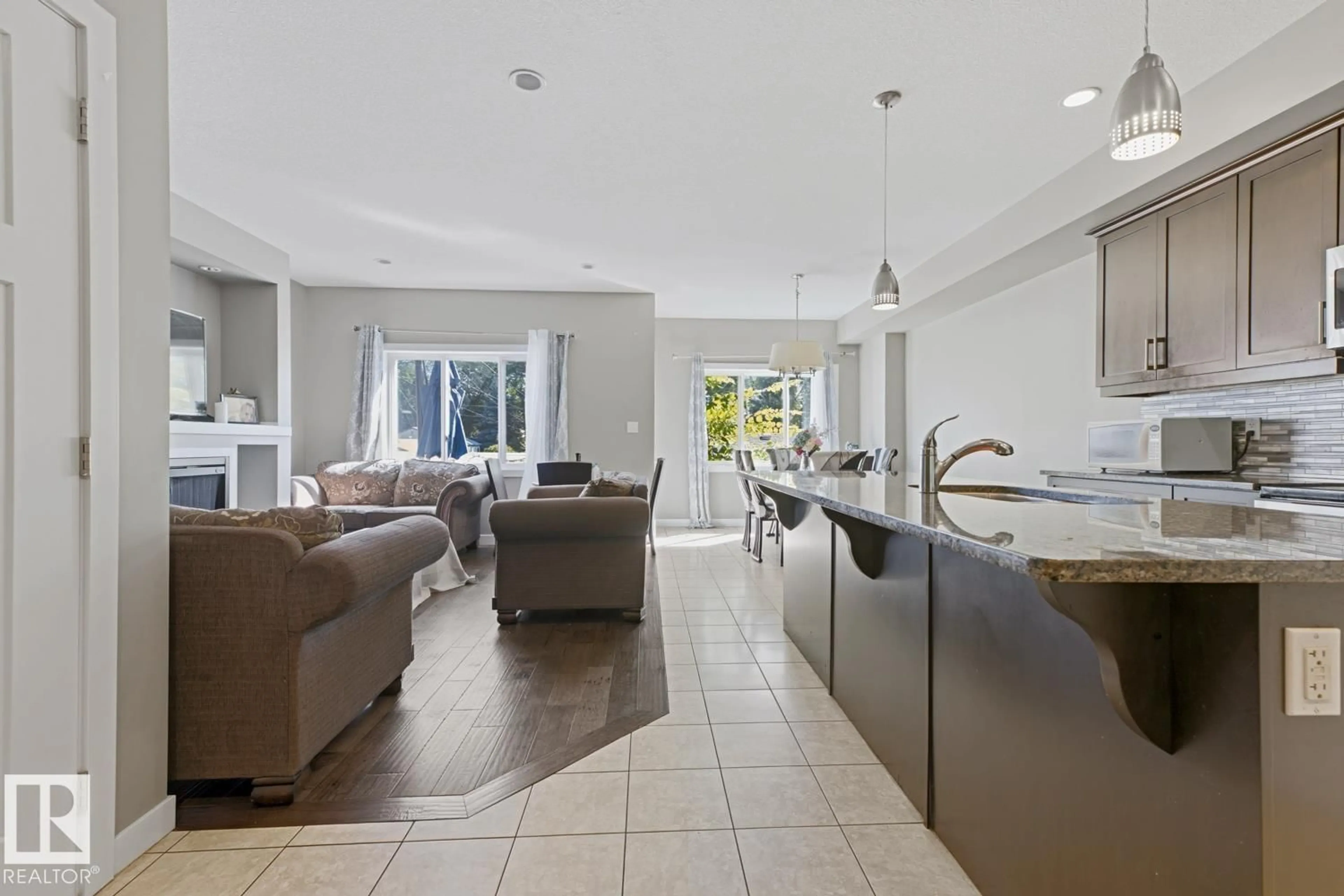 Open concept kitchen, ceramic/tile floor for NW - 11827 56 ST, Edmonton Alberta T5W3S7