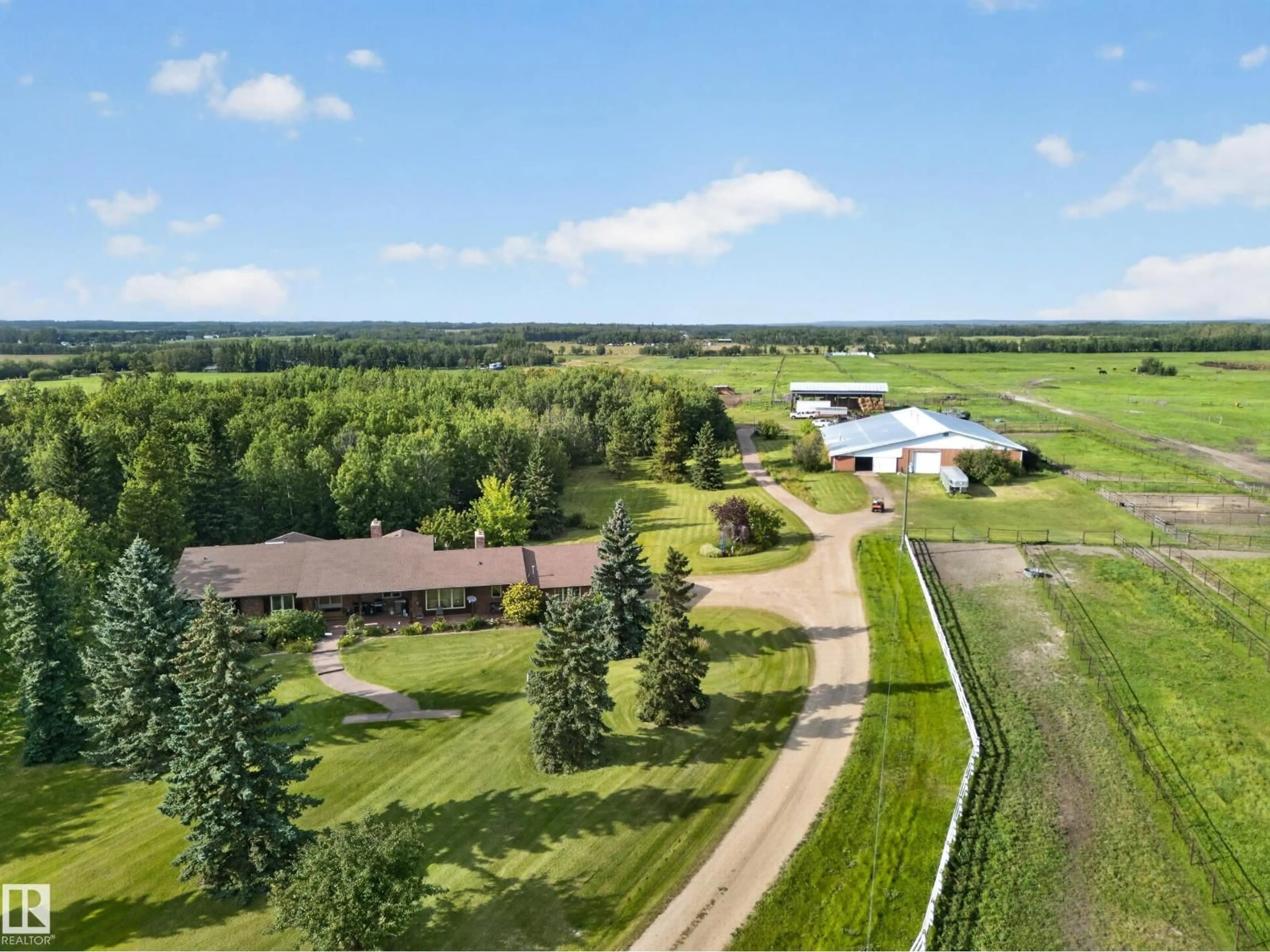 A pic from outside/outdoor area/front of a property/back of a property/a pic from drone, unknown for 22066 TWP ROAD 522, Rural Strathcona County Alberta T8E1G2