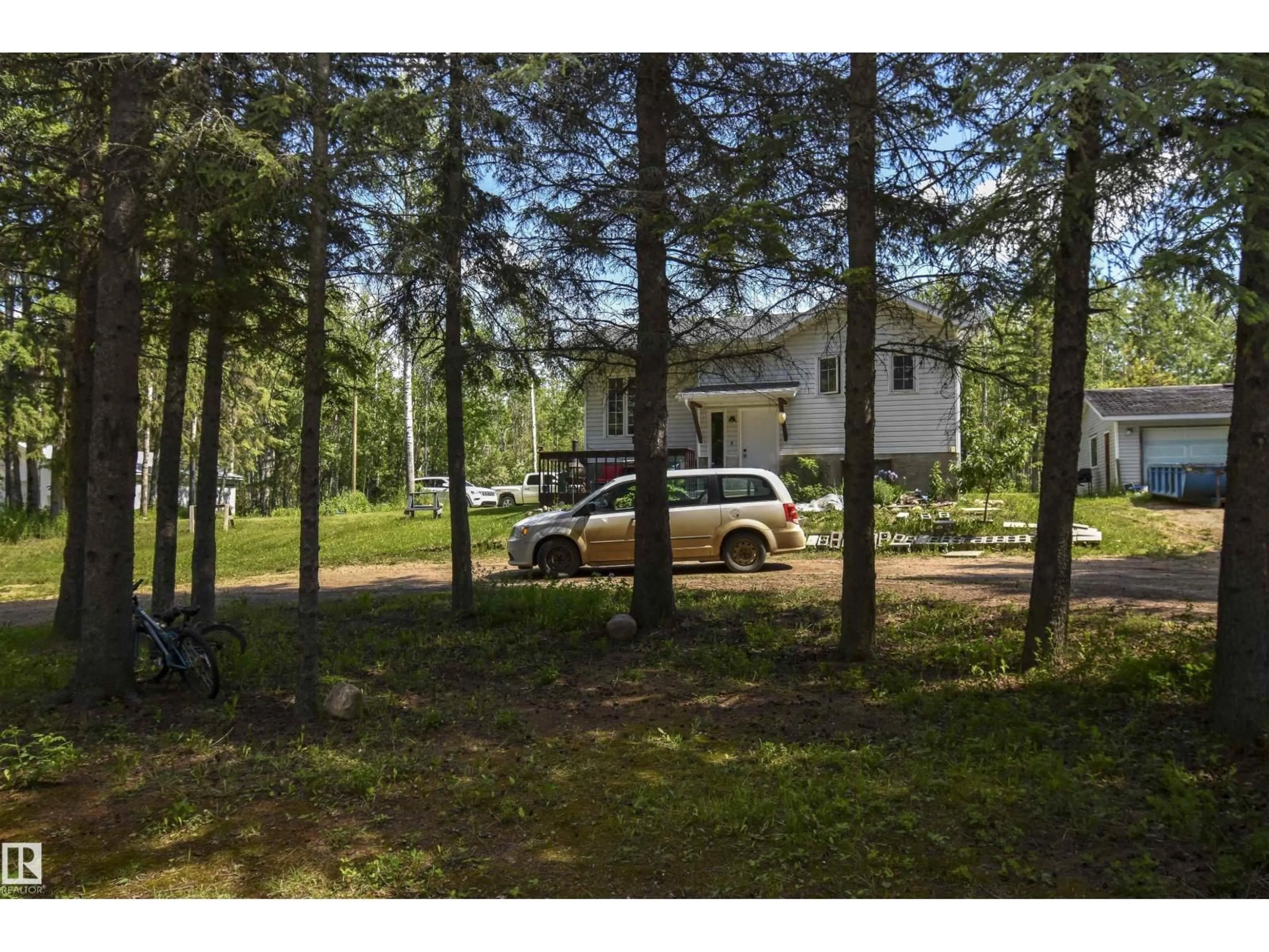 A pic from outside/outdoor area/front of a property/back of a property/a pic from drone, forest/trees view for 661021A HWY 827, Rural Athabasca County Alberta T9S2A9