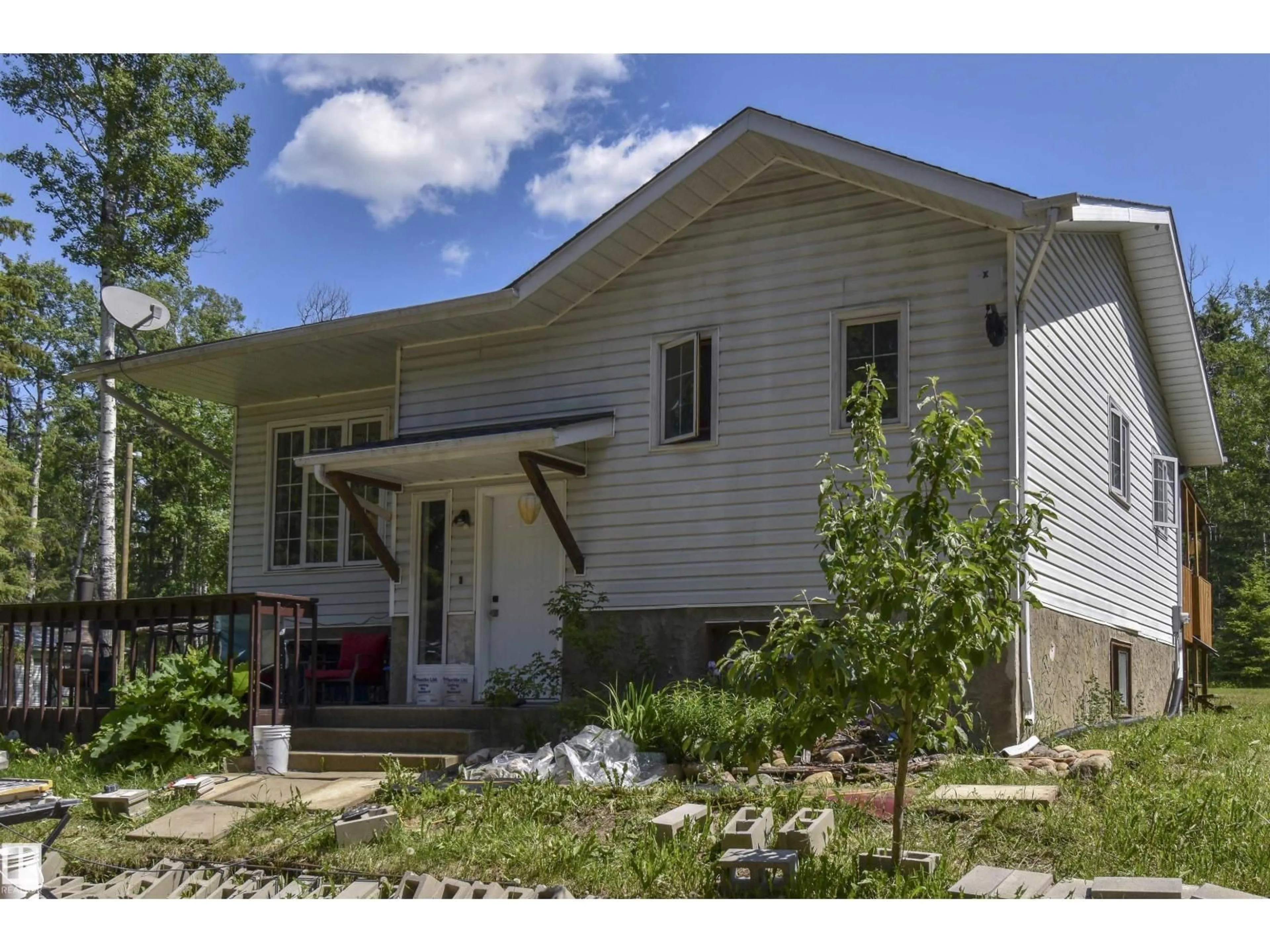 Home with vinyl exterior material, street for 661021A HWY 827, Rural Athabasca County Alberta T9S2A9