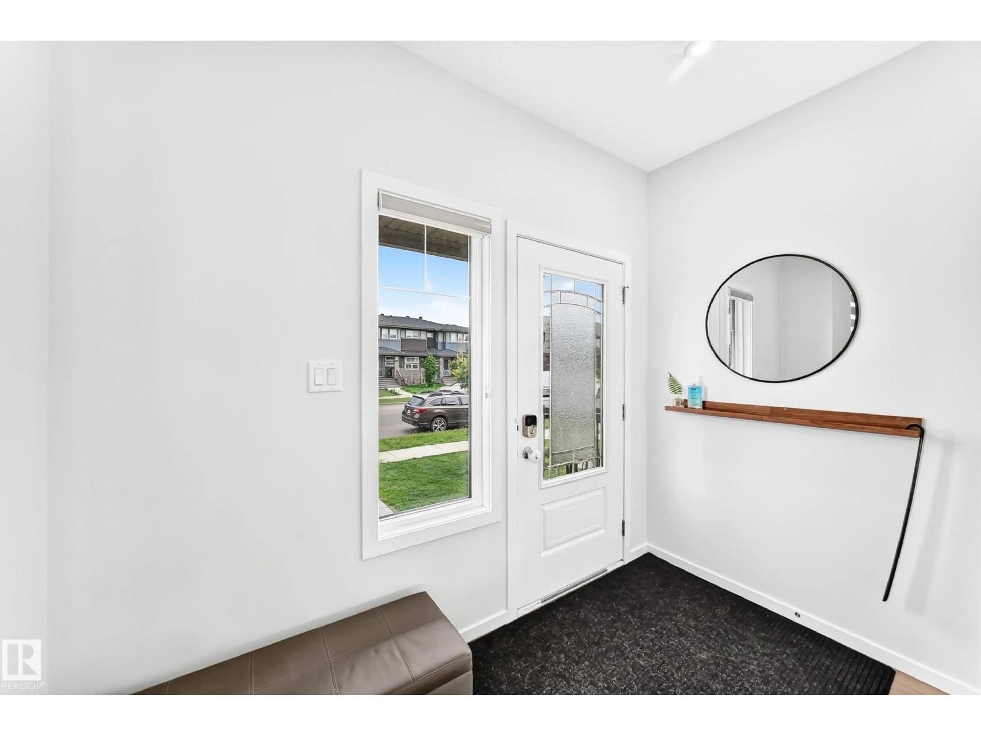 Indoor entryway for 5233 22 AV, Edmonton Alberta T6X2H8