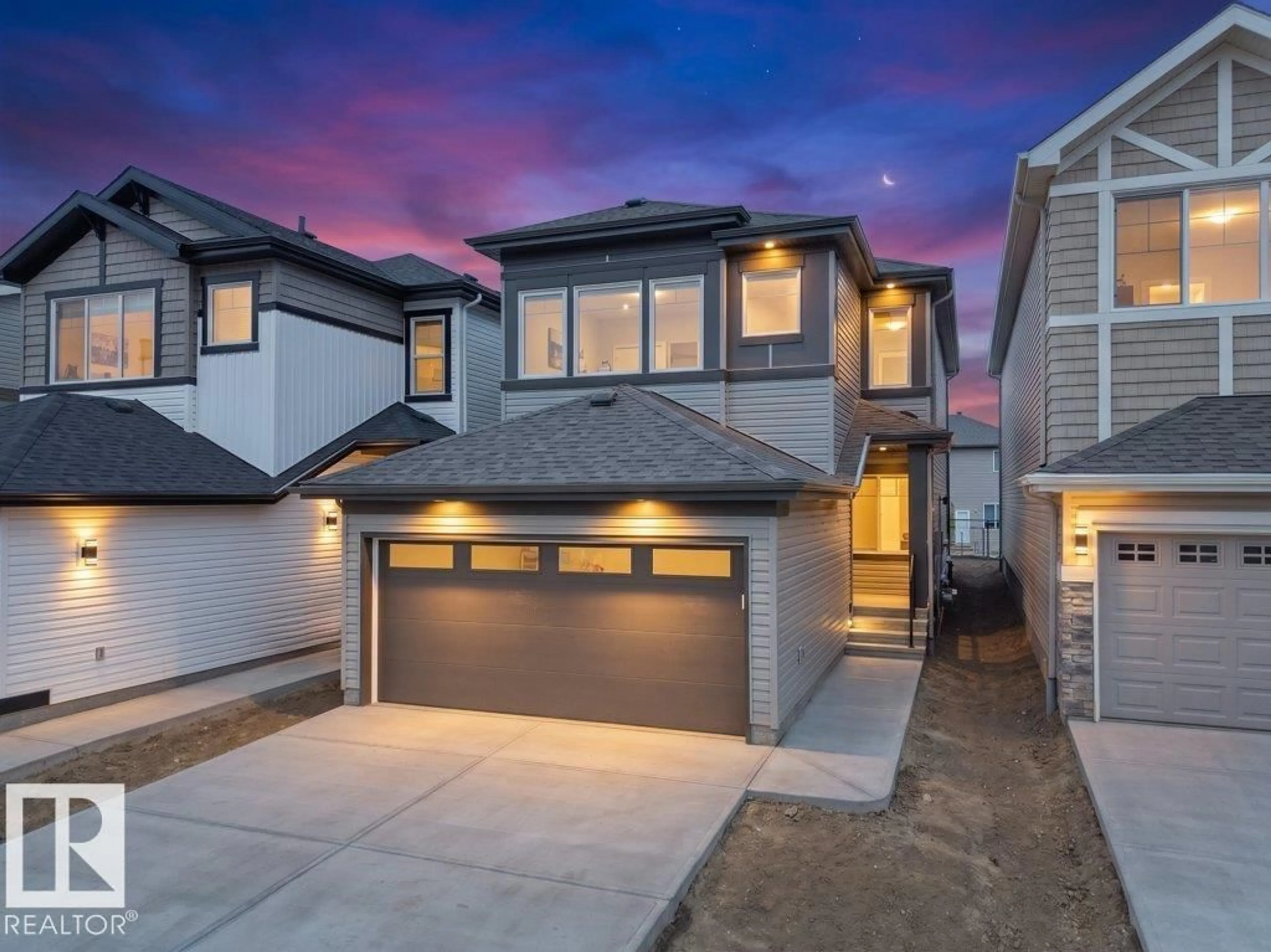 Home with brick exterior material, street for 912 17 AVE NW, Edmonton Alberta T6T2X8