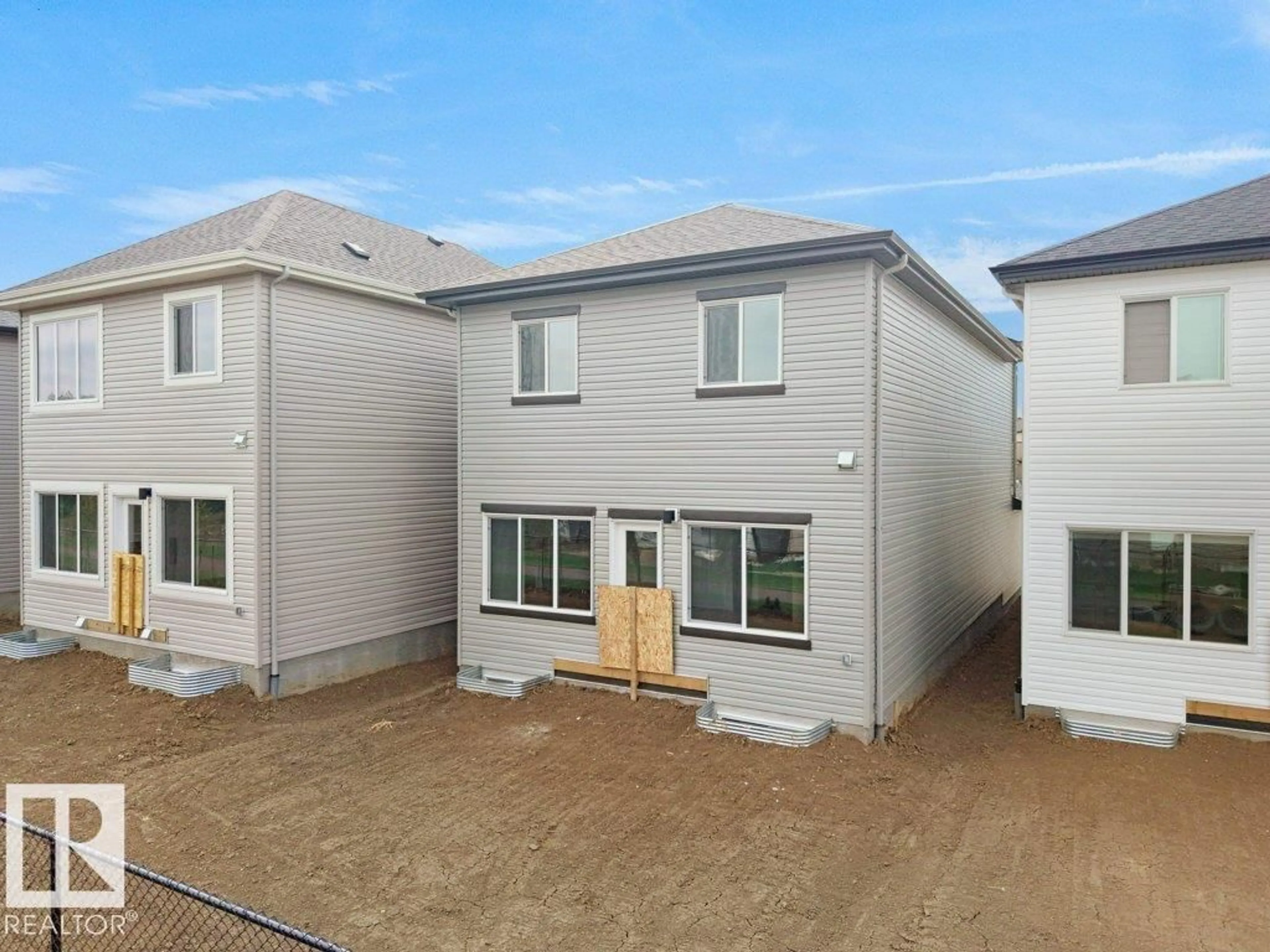 A pic from outside/outdoor area/front of a property/back of a property/a pic from drone, street for 912 17 AVE NW, Edmonton Alberta T6T2X8