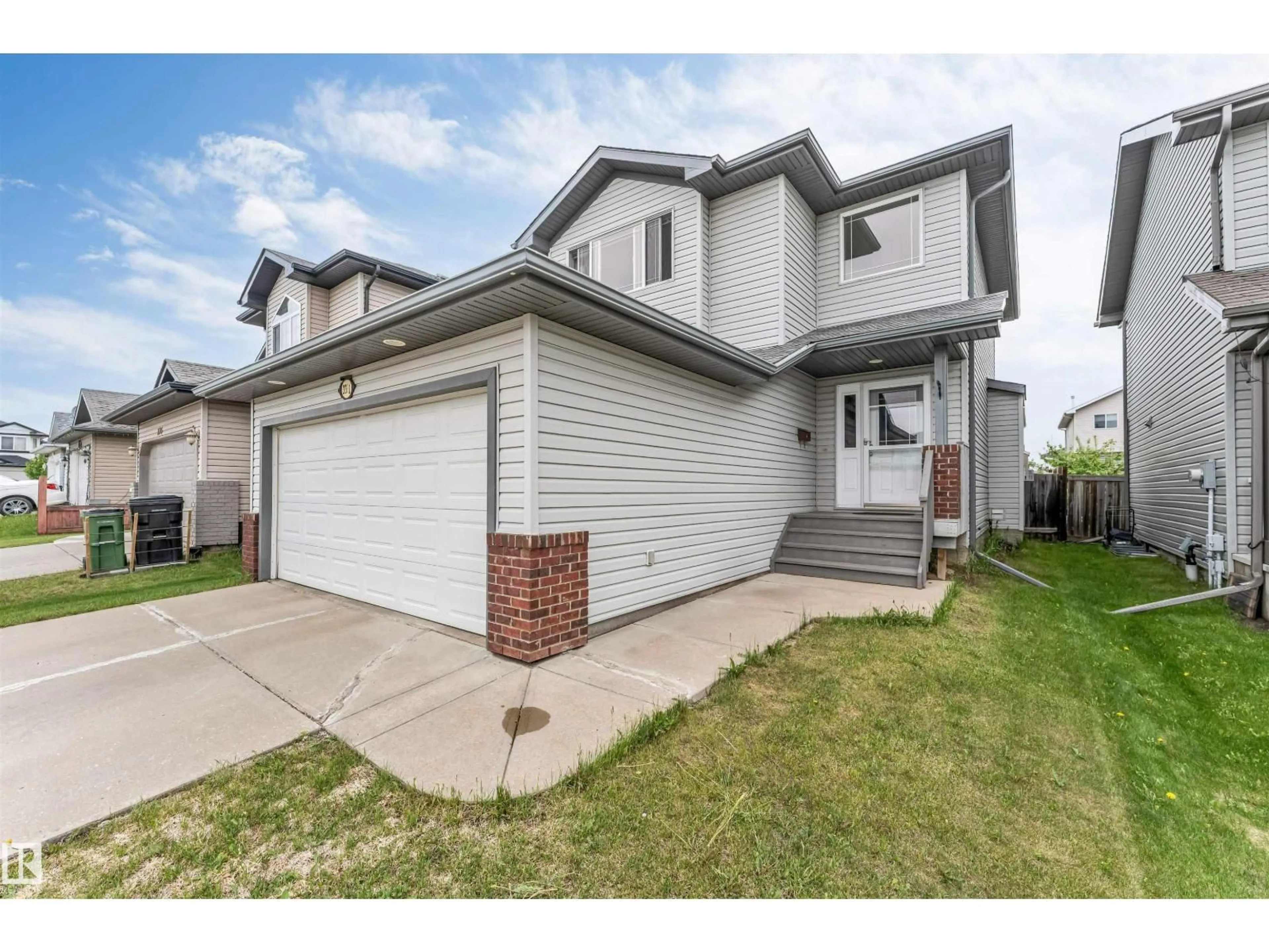 Home with vinyl exterior material, street for NW - 3311 21 ST, Edmonton Alberta T6T0C4