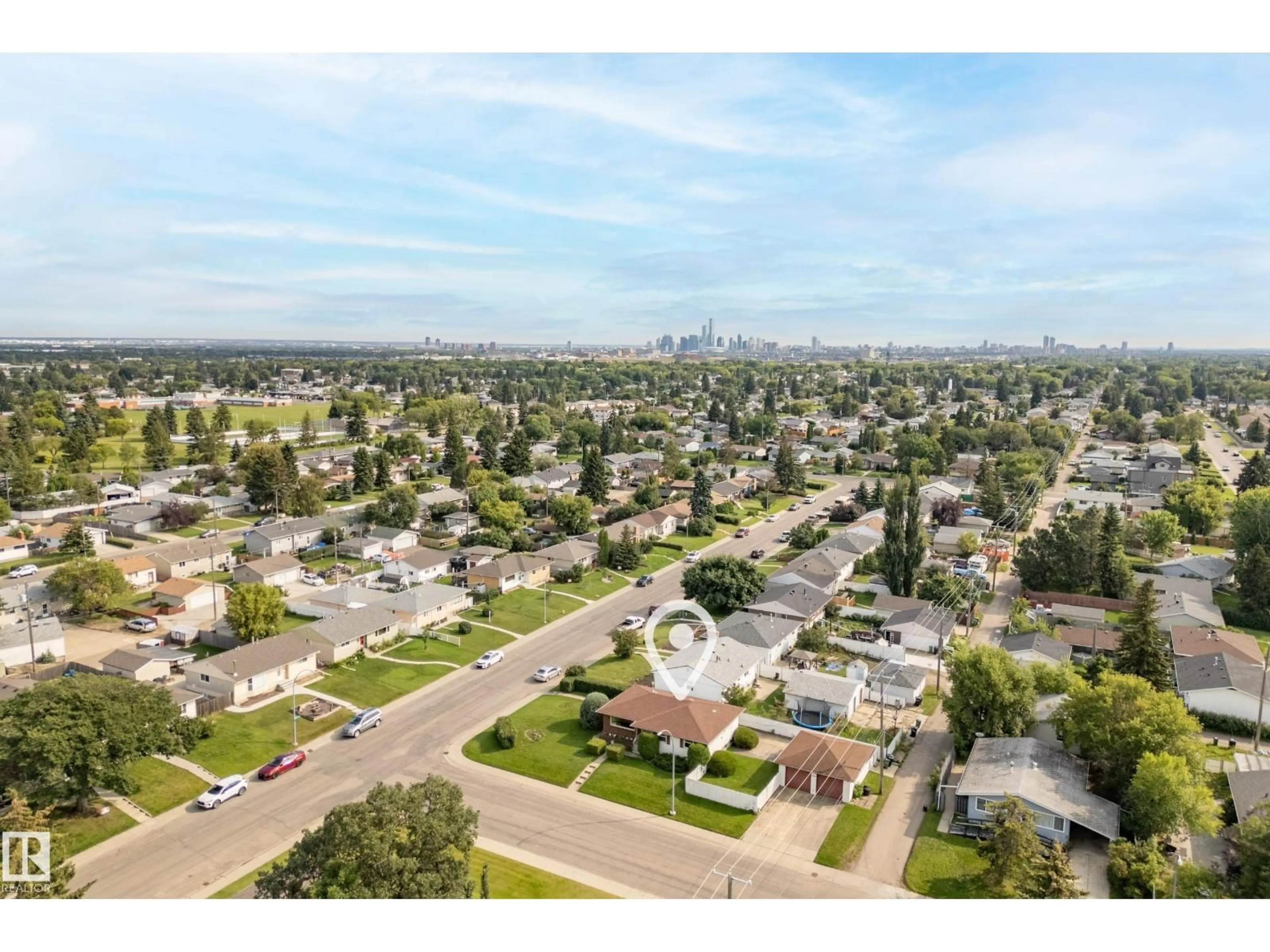 A pic from outside/outdoor area/front of a property/back of a property/a pic from drone, street for 12321 136 AV, Edmonton Alberta T5L4A7