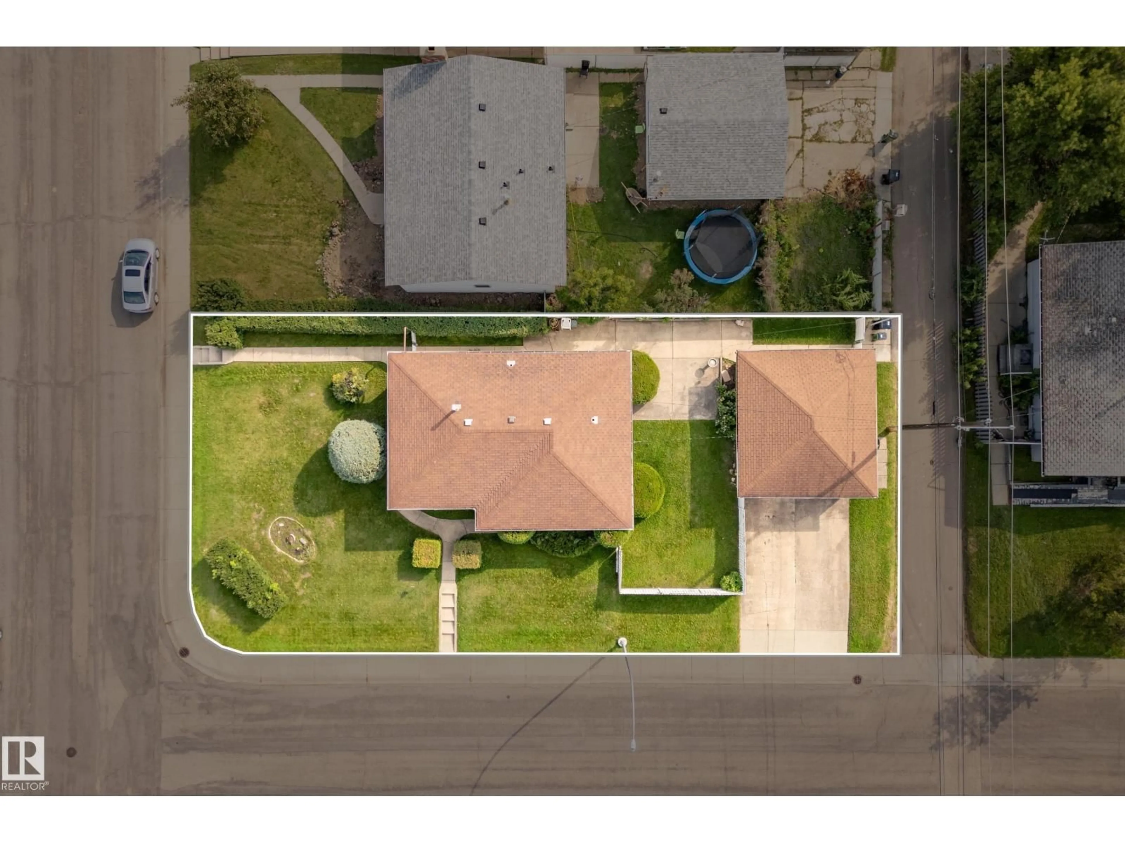 A pic from outside/outdoor area/front of a property/back of a property/a pic from drone, street for 12321 136 AV, Edmonton Alberta T5L4A7
