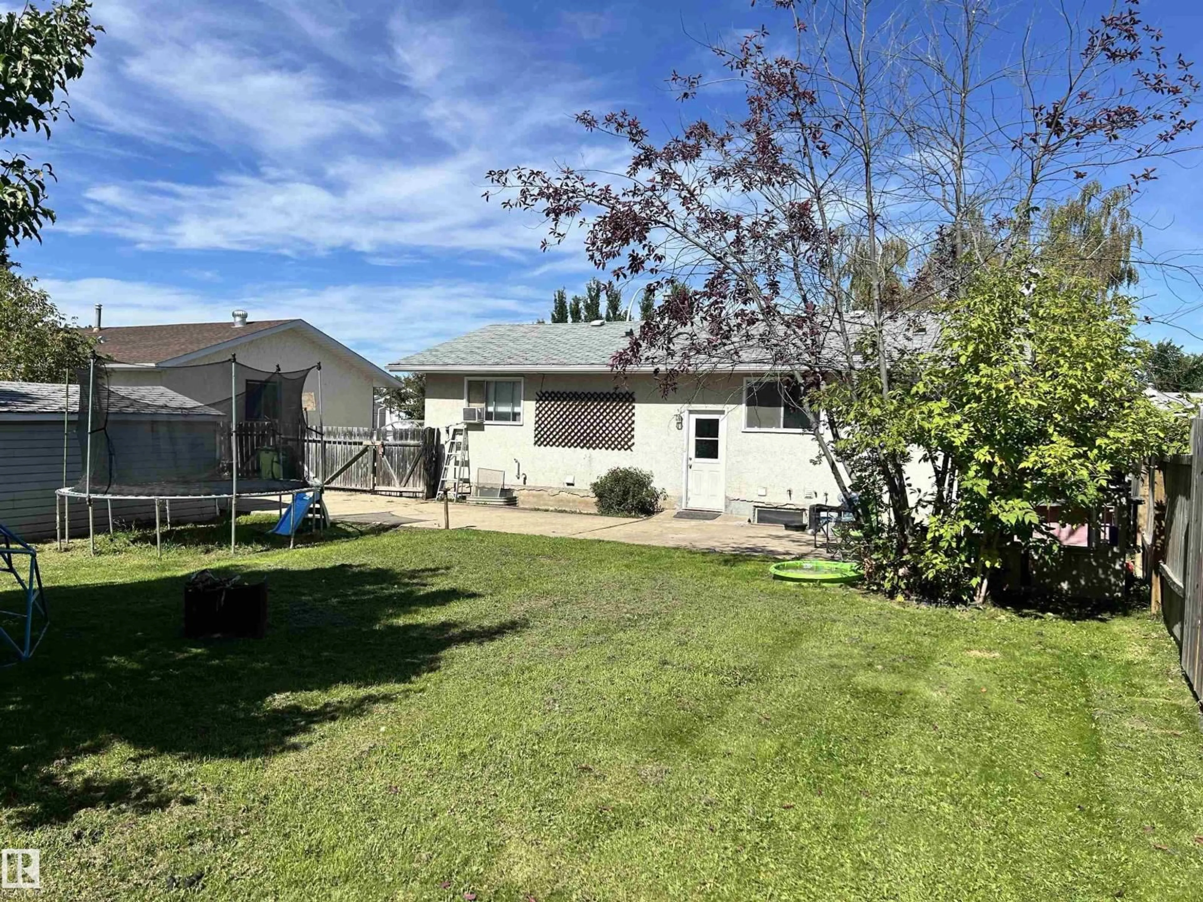 A pic from outside/outdoor area/front of a property/back of a property/a pic from drone, unknown for 10623 107 ST, Westlock Alberta T7P1E3