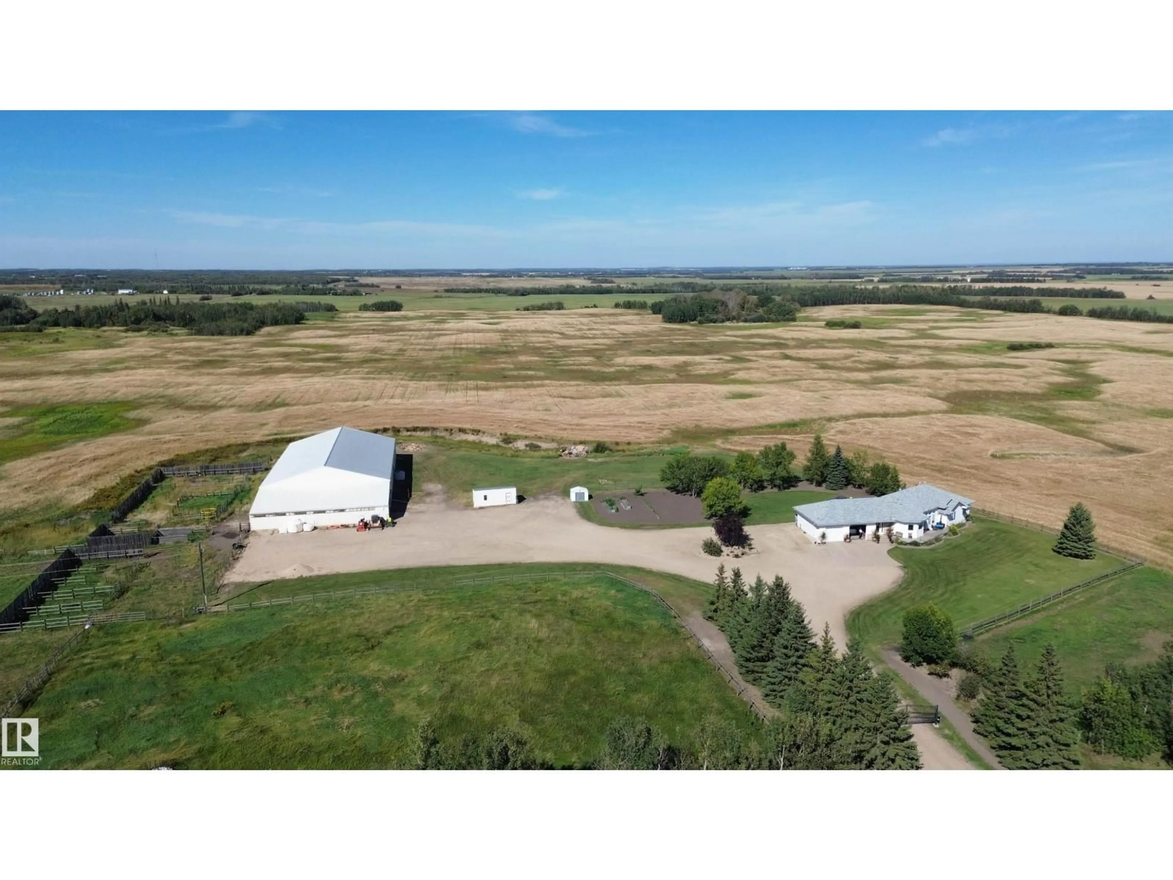 A pic from outside/outdoor area/front of a property/back of a property/a pic from drone, unknown for 26526 TWP ROAD 572, Rural Westlock County Alberta T0G0H0