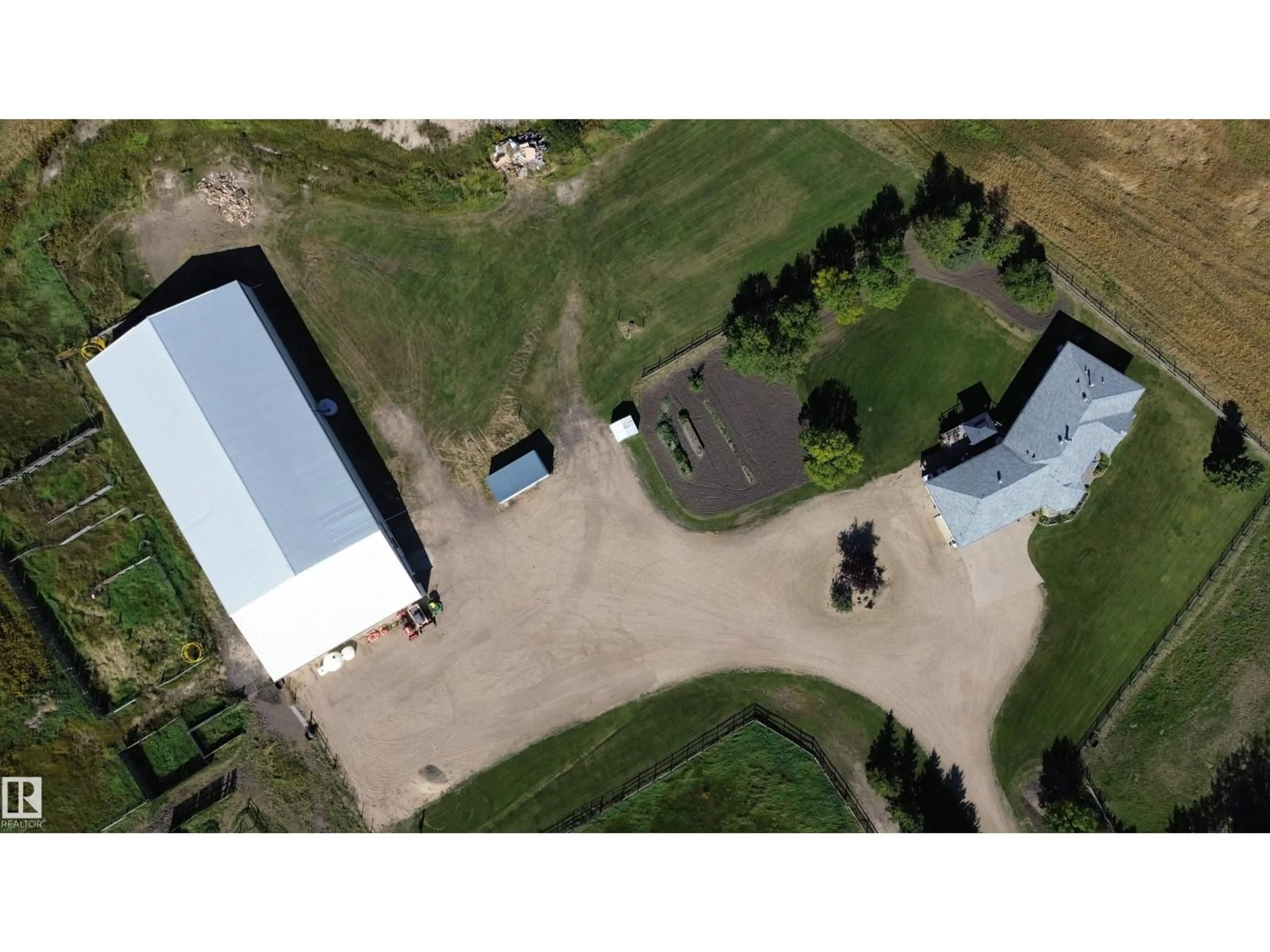 A pic from outside/outdoor area/front of a property/back of a property/a pic from drone, building for 26526 TWP ROAD 572, Rural Westlock County Alberta T0G0H0