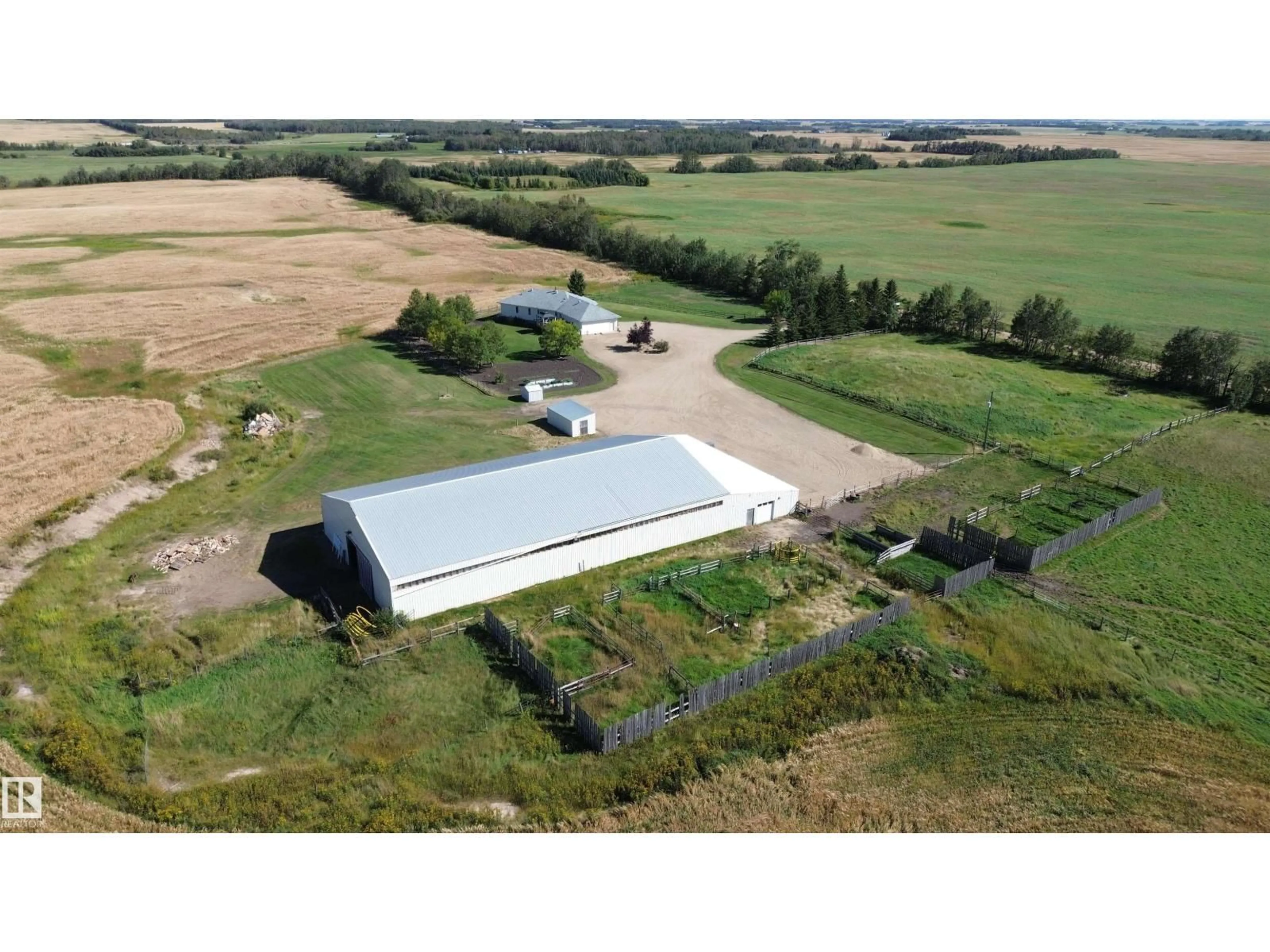 A pic from outside/outdoor area/front of a property/back of a property/a pic from drone, building for 26526 TWP ROAD 572, Rural Westlock County Alberta T0G0H0