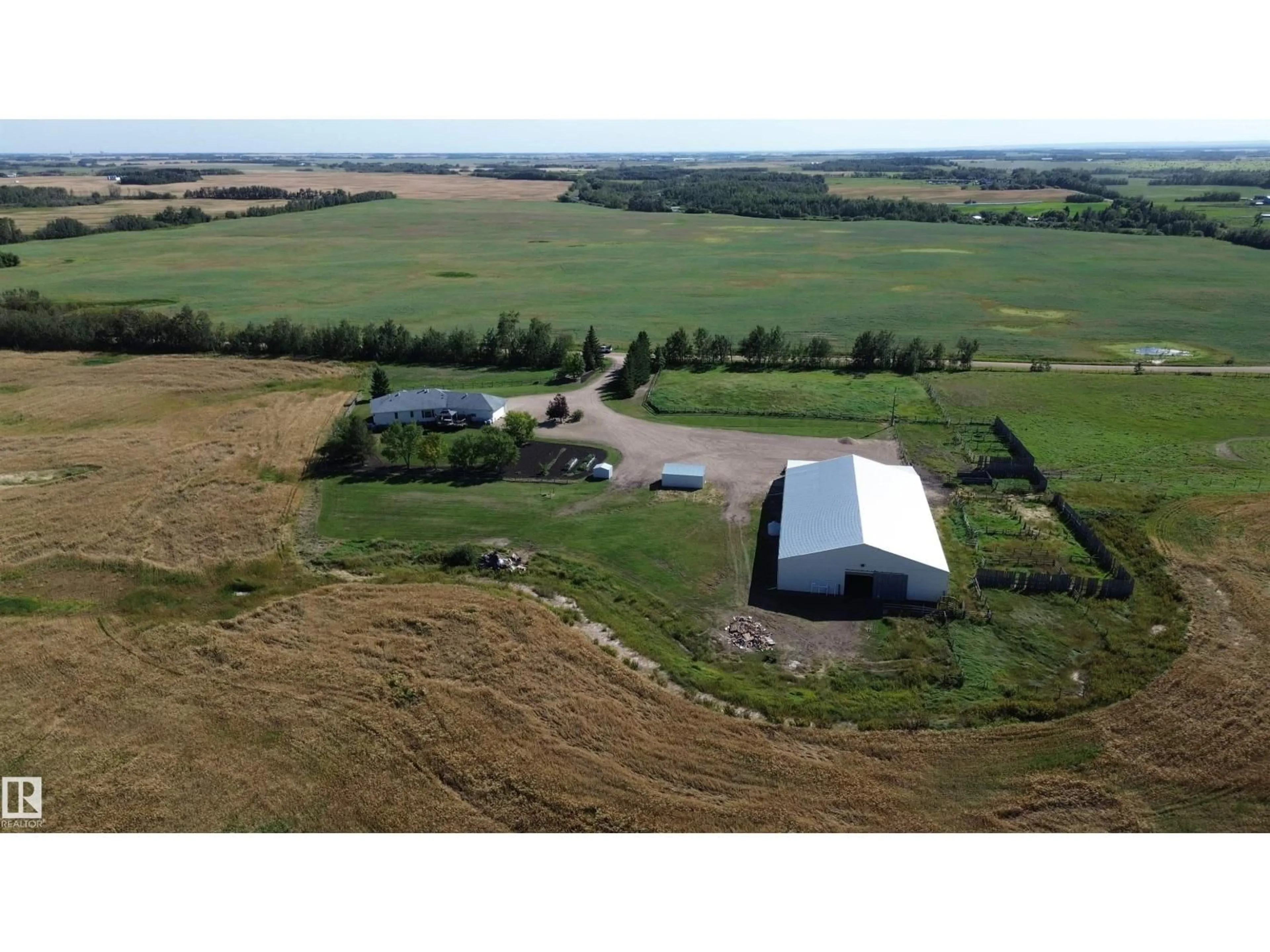 A pic from outside/outdoor area/front of a property/back of a property/a pic from drone, building for 26526 TWP ROAD 572, Rural Westlock County Alberta T0G0H0