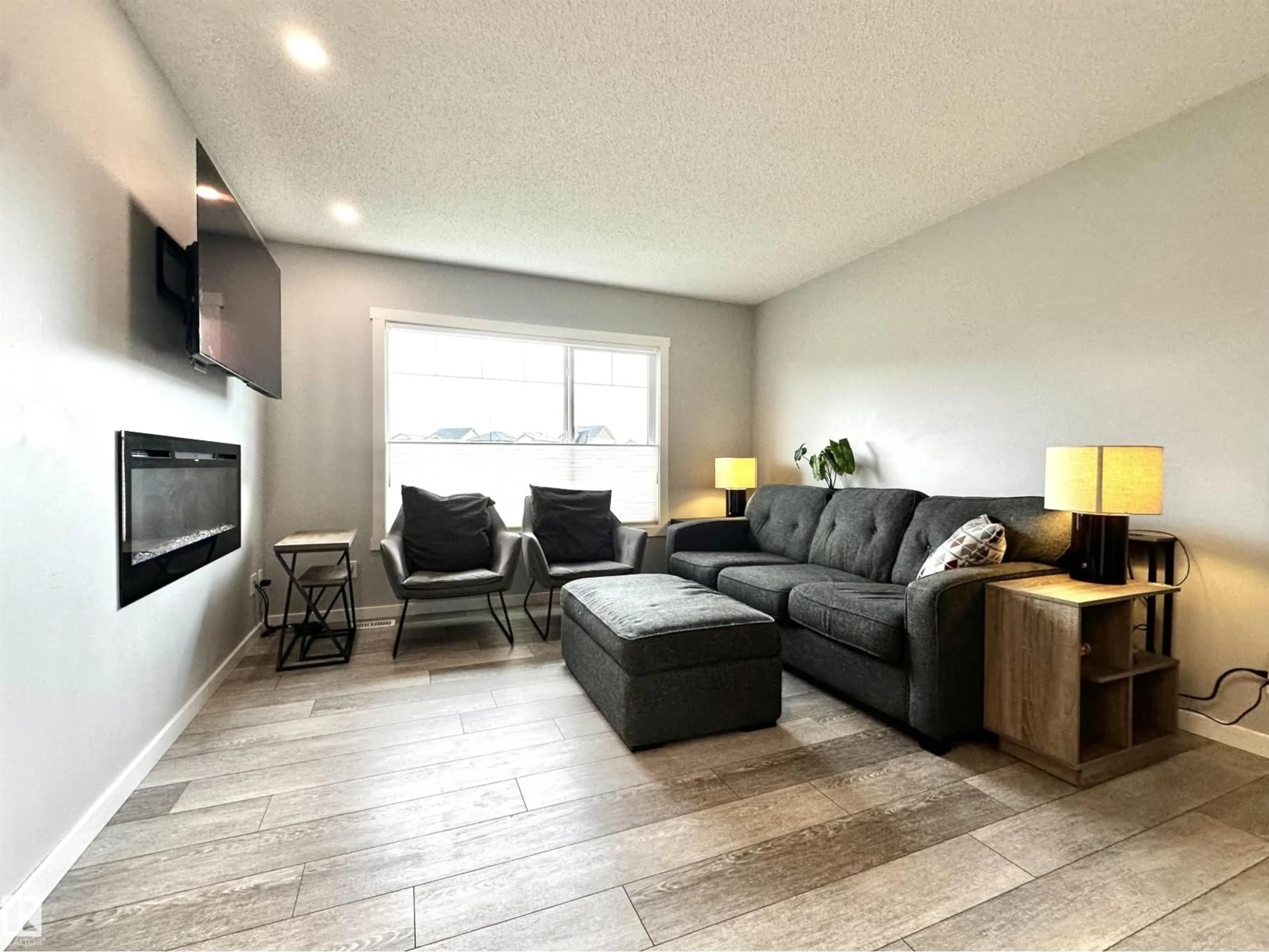 Living room with furniture, unknown for 20947 95 AV, Edmonton Alberta T5T7J6