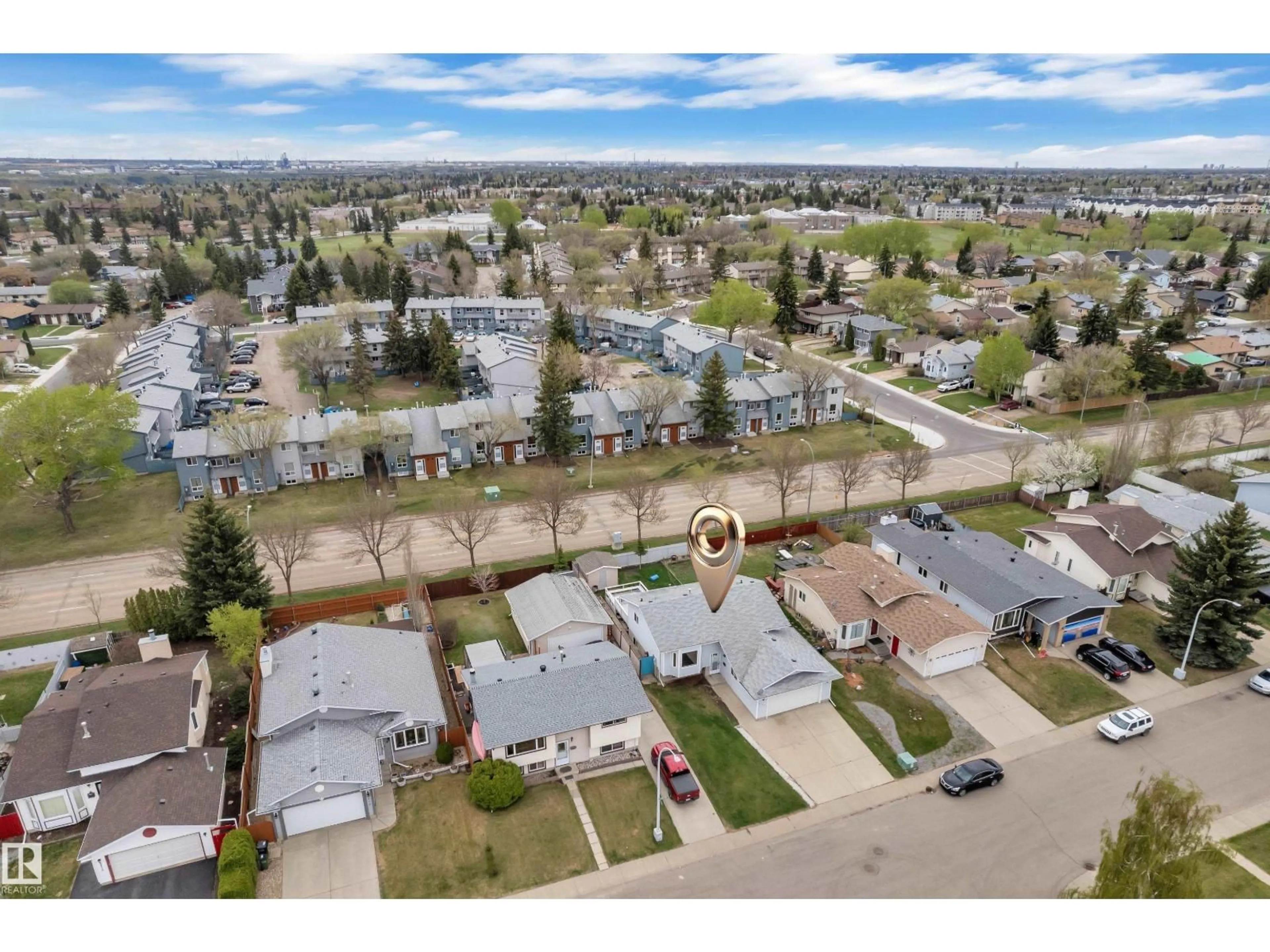 A pic from outside/outdoor area/front of a property/back of a property/a pic from drone, water/lake/river/ocean view for NW - 3227 145 AV, Edmonton Alberta T5Y2E9