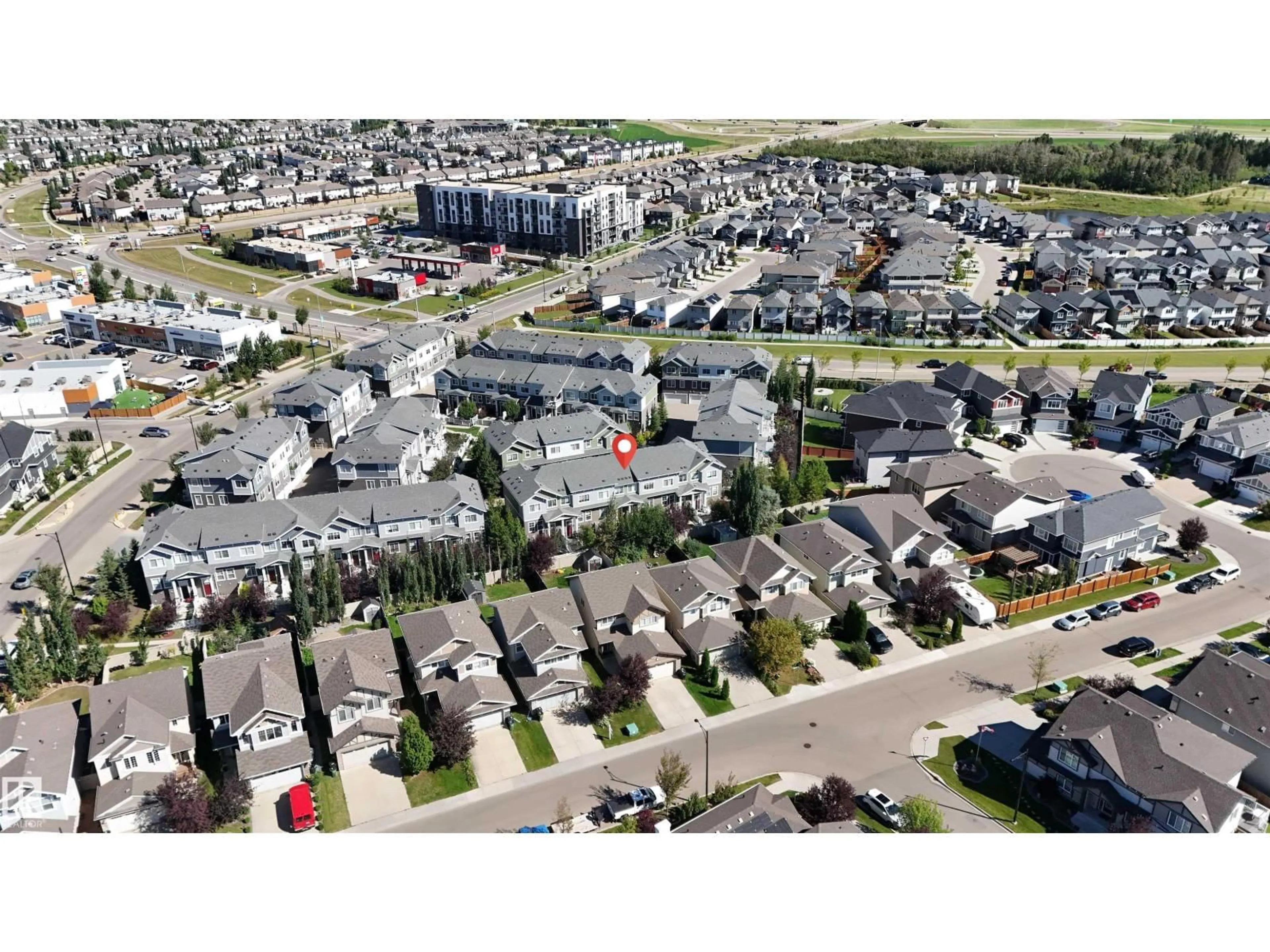 A pic from outside/outdoor area/front of a property/back of a property/a pic from drone, street for 35 - 7385 EDGEMONT WY, Edmonton Alberta T6M0R9