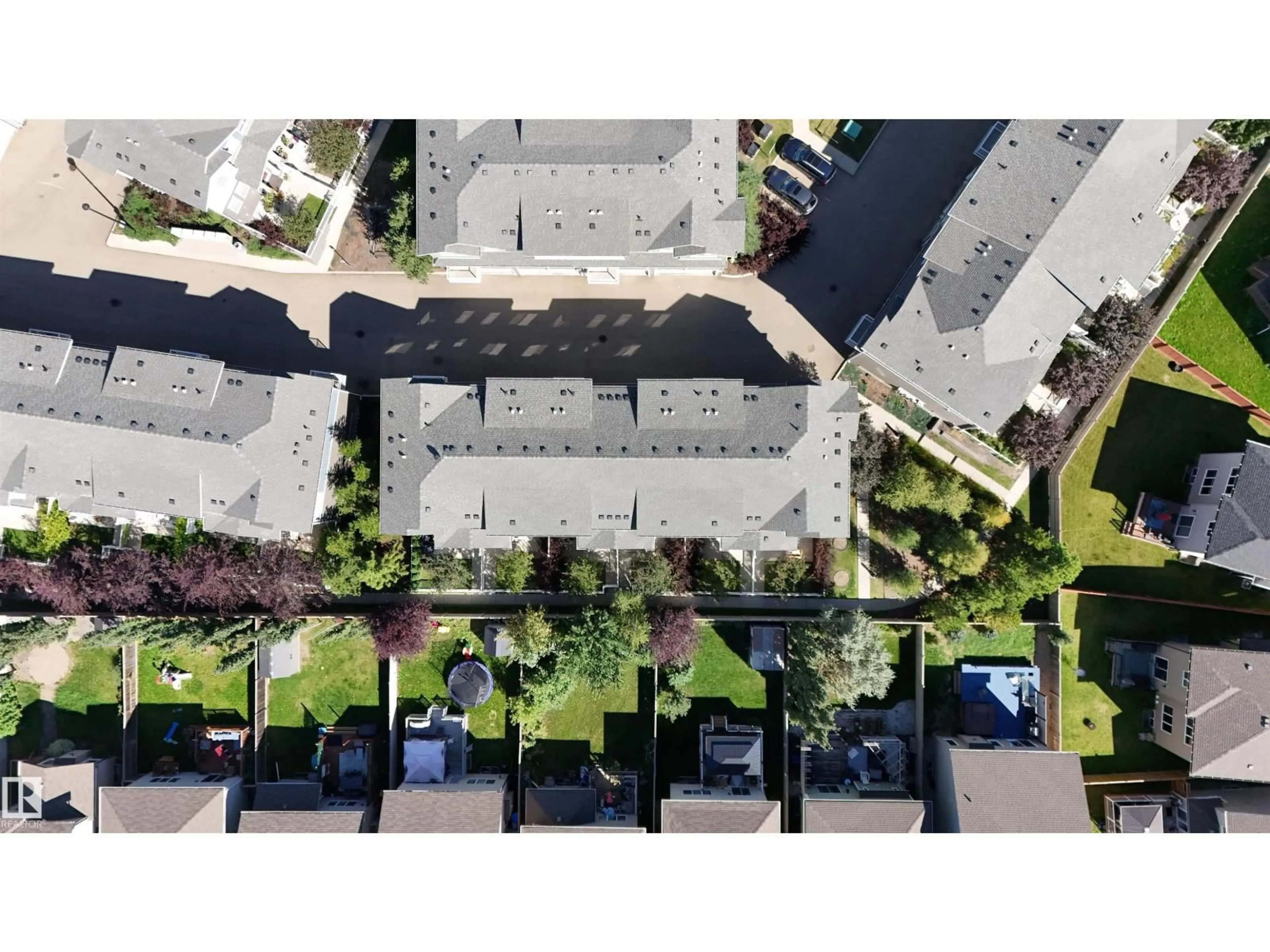 A pic from outside/outdoor area/front of a property/back of a property/a pic from drone, street for 35 - 7385 EDGEMONT WY, Edmonton Alberta T6M0R9