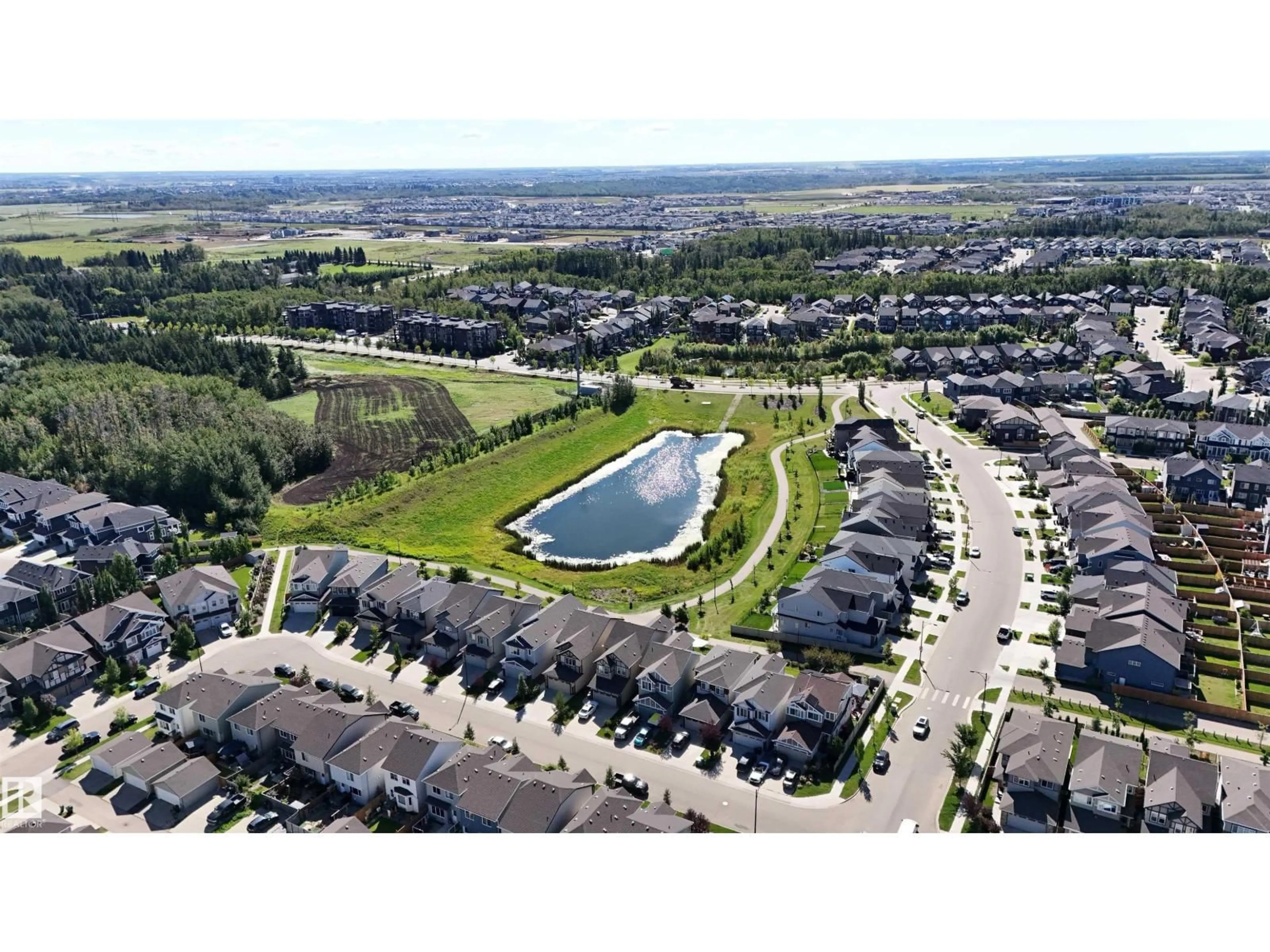 A pic from outside/outdoor area/front of a property/back of a property/a pic from drone, water/lake/river/ocean view for 35 - 7385 EDGEMONT WY, Edmonton Alberta T6M0R9