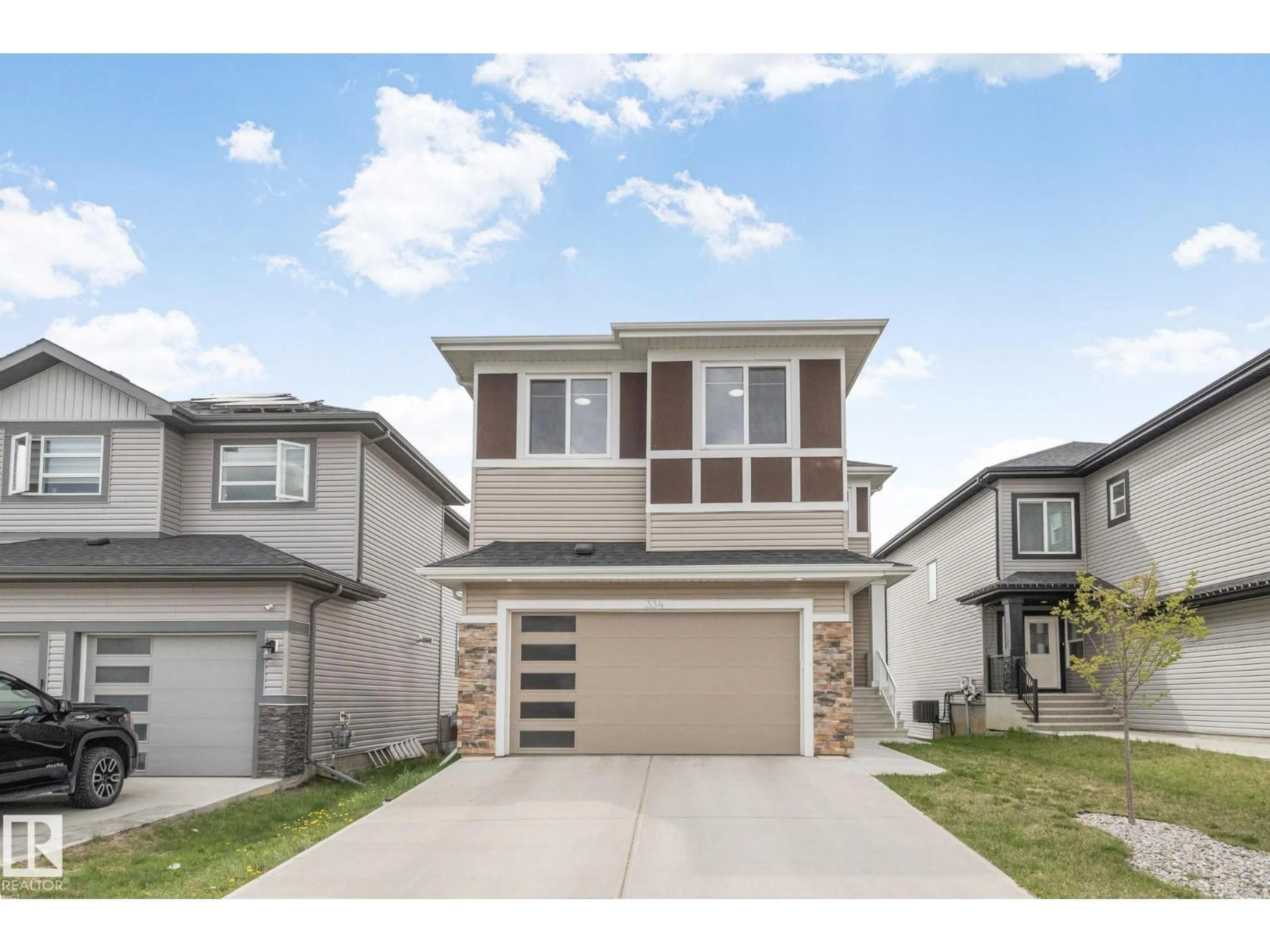 Home with vinyl exterior material, street for 334 ASTON CL, Leduc Alberta T9E1H9