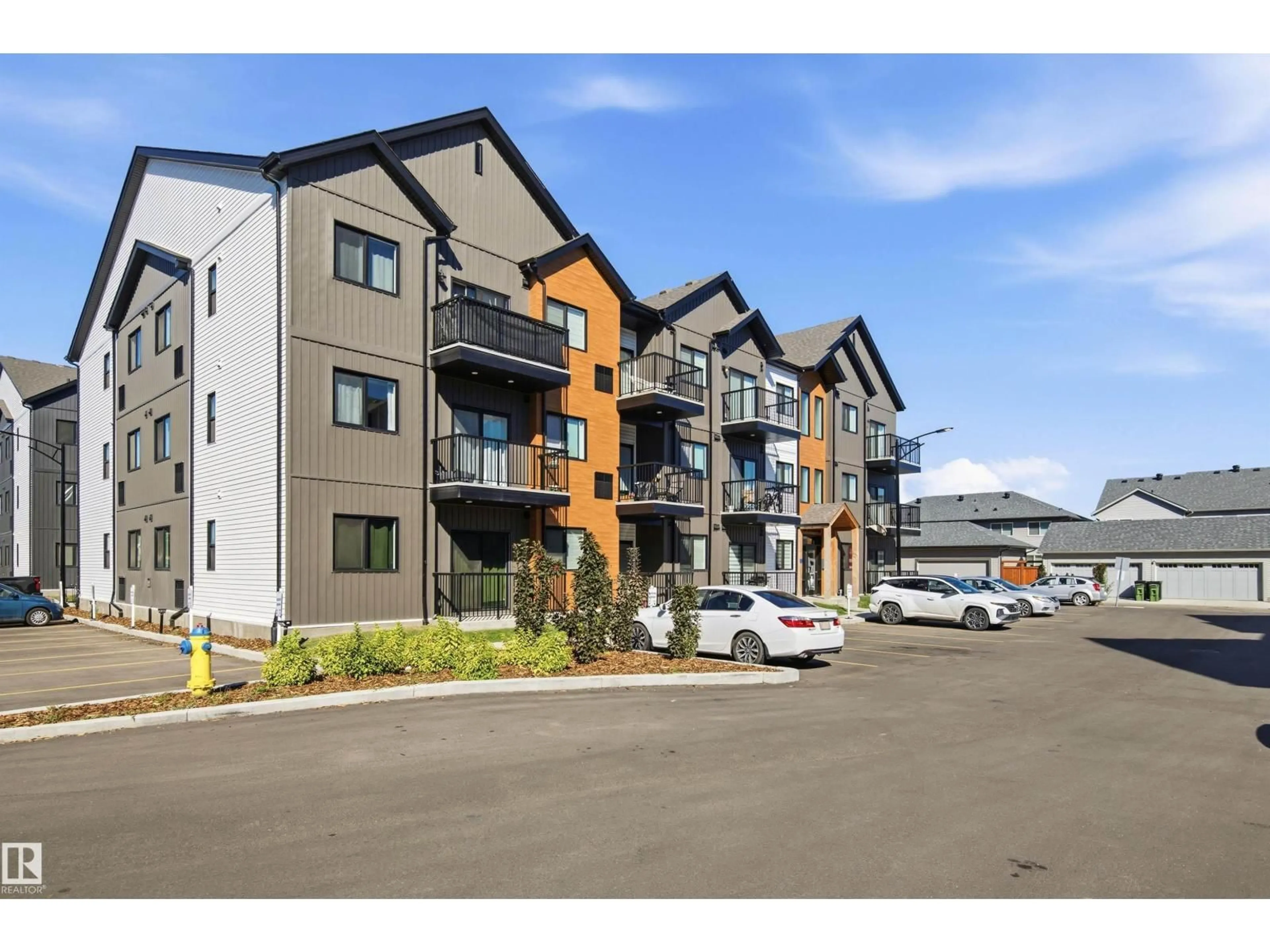 A pic from outside/outdoor area/front of a property/back of a property/a pic from drone, unknown for #306 - 9223 228 ST, Edmonton Alberta T5T4T1