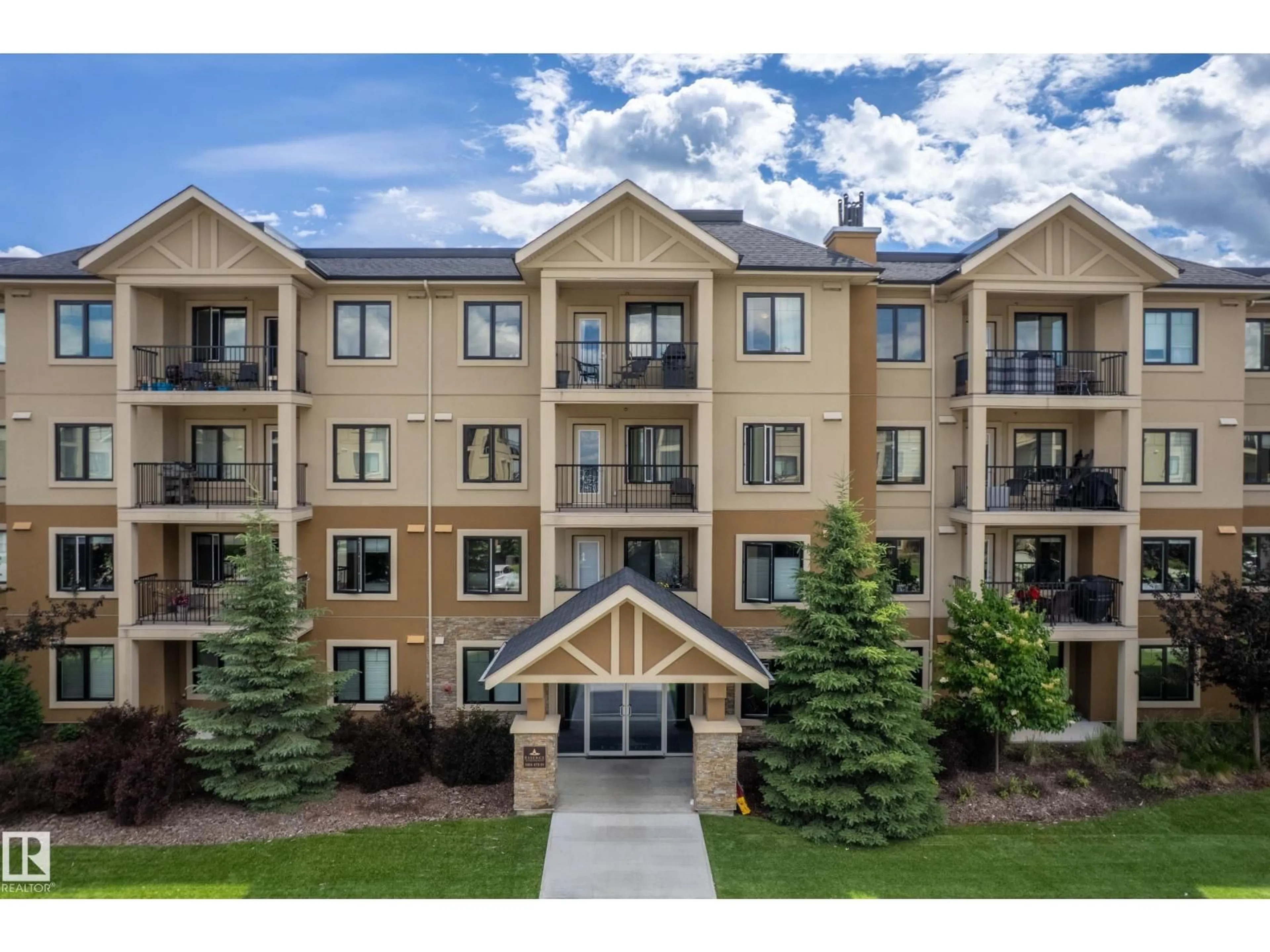 A pic from outside/outdoor area/front of a property/back of a property/a pic from drone, mountain view for #107 - 1031 173 ST, Edmonton Alberta T6W3E4