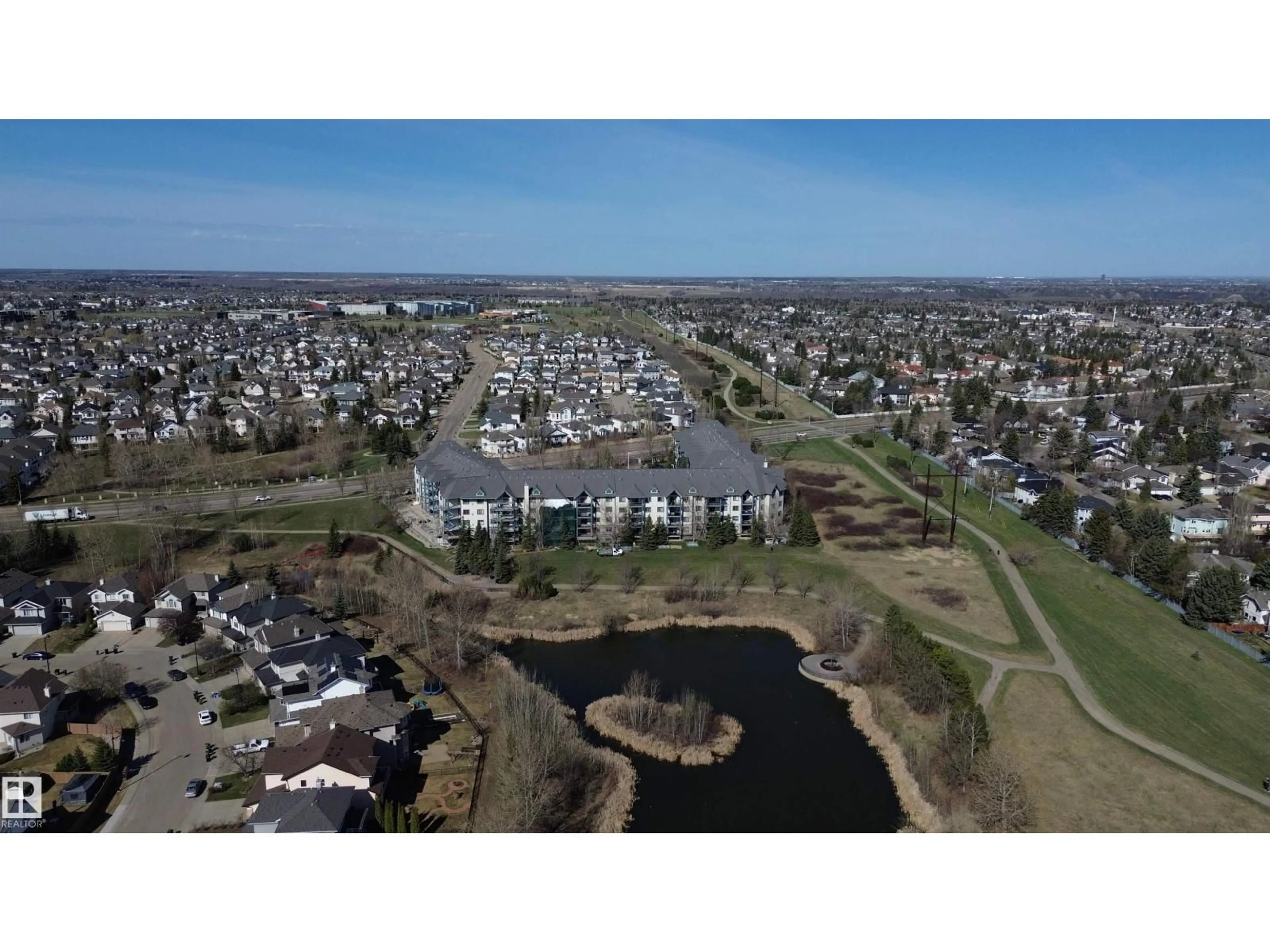 A pic from outside/outdoor area/front of a property/back of a property/a pic from drone, water/lake/river/ocean view for 134 - 2903 RABBIT HILL RD, Edmonton Alberta T6R0P2