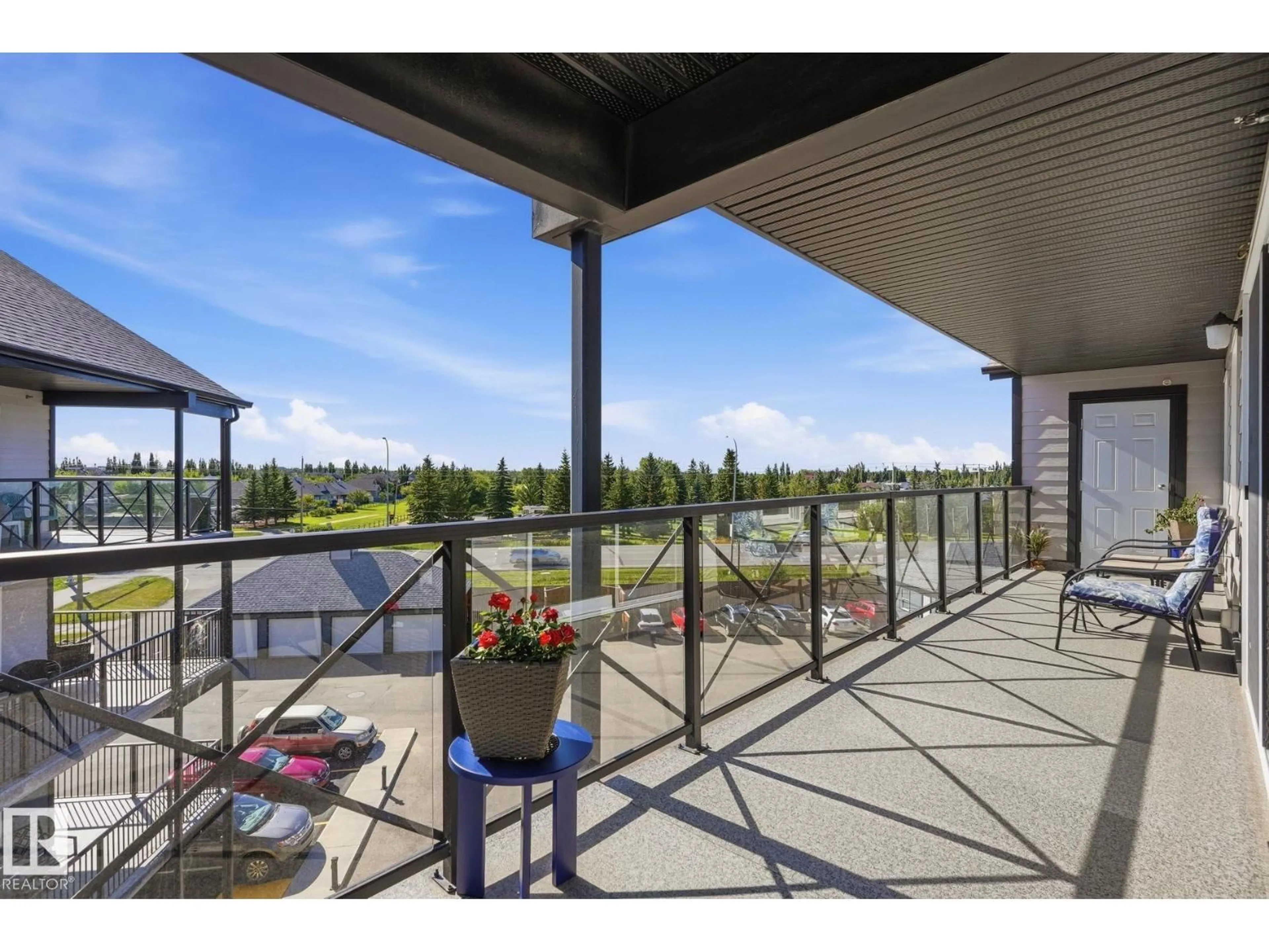 Patio, water/lake/river/ocean view for #408 - 4103 50 ST, Beaumont Alberta T4X2C7