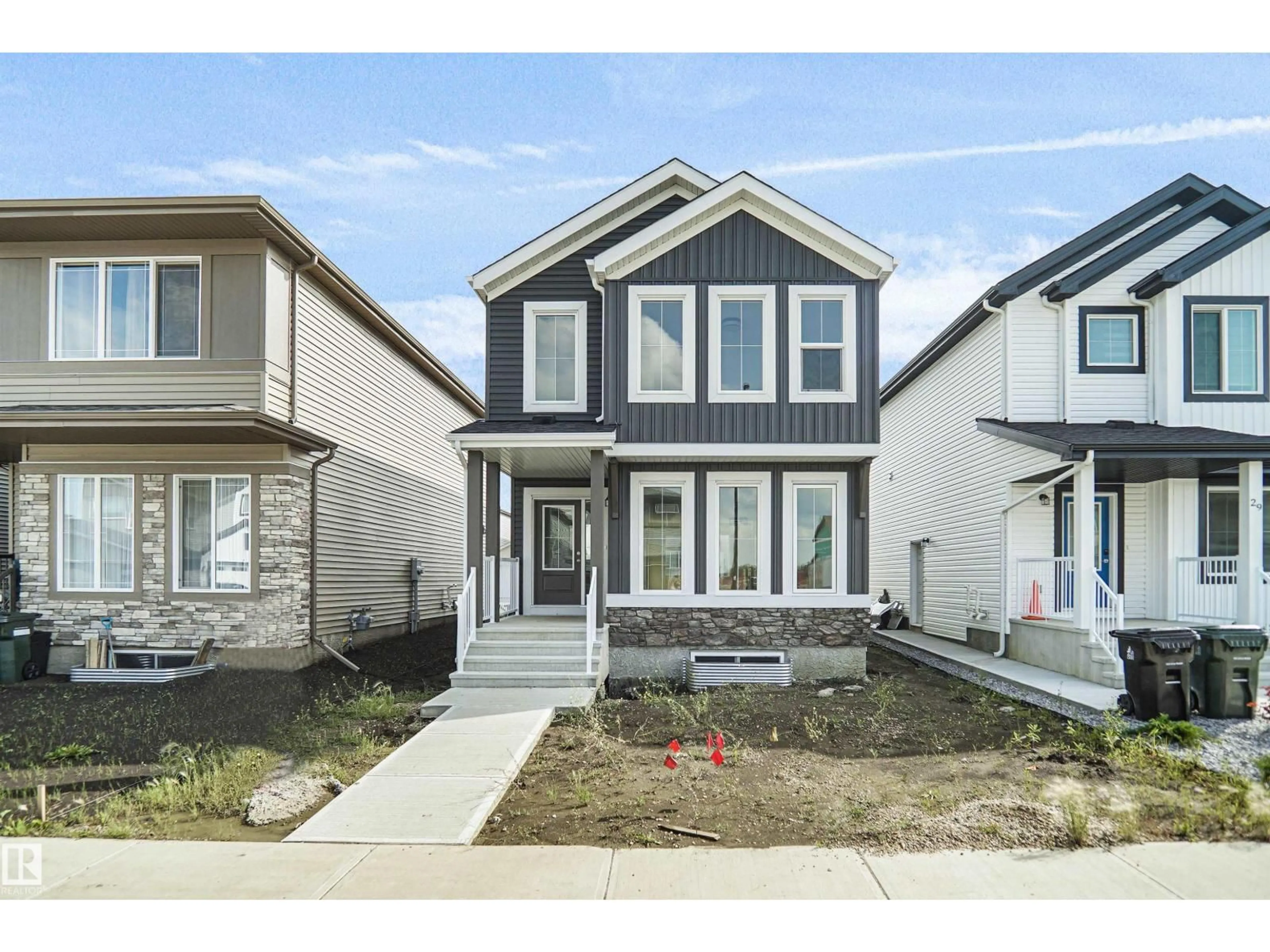 Home with vinyl exterior material, street for 31 ETON LI, Spruce Grove Alberta T7X2Z7