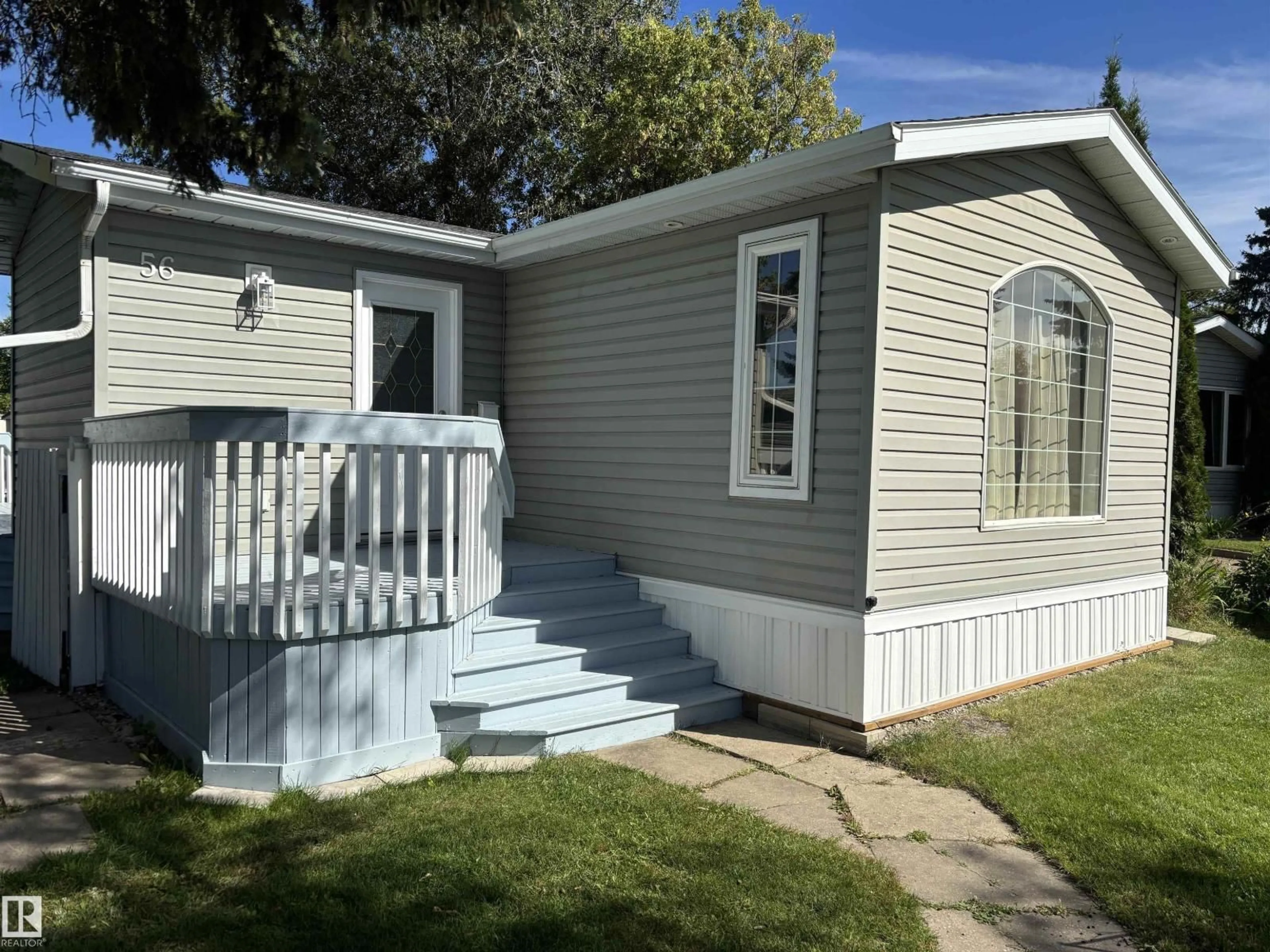 Home with vinyl exterior material, street for 56 RIM RD, Edmonton Alberta T6P1C2