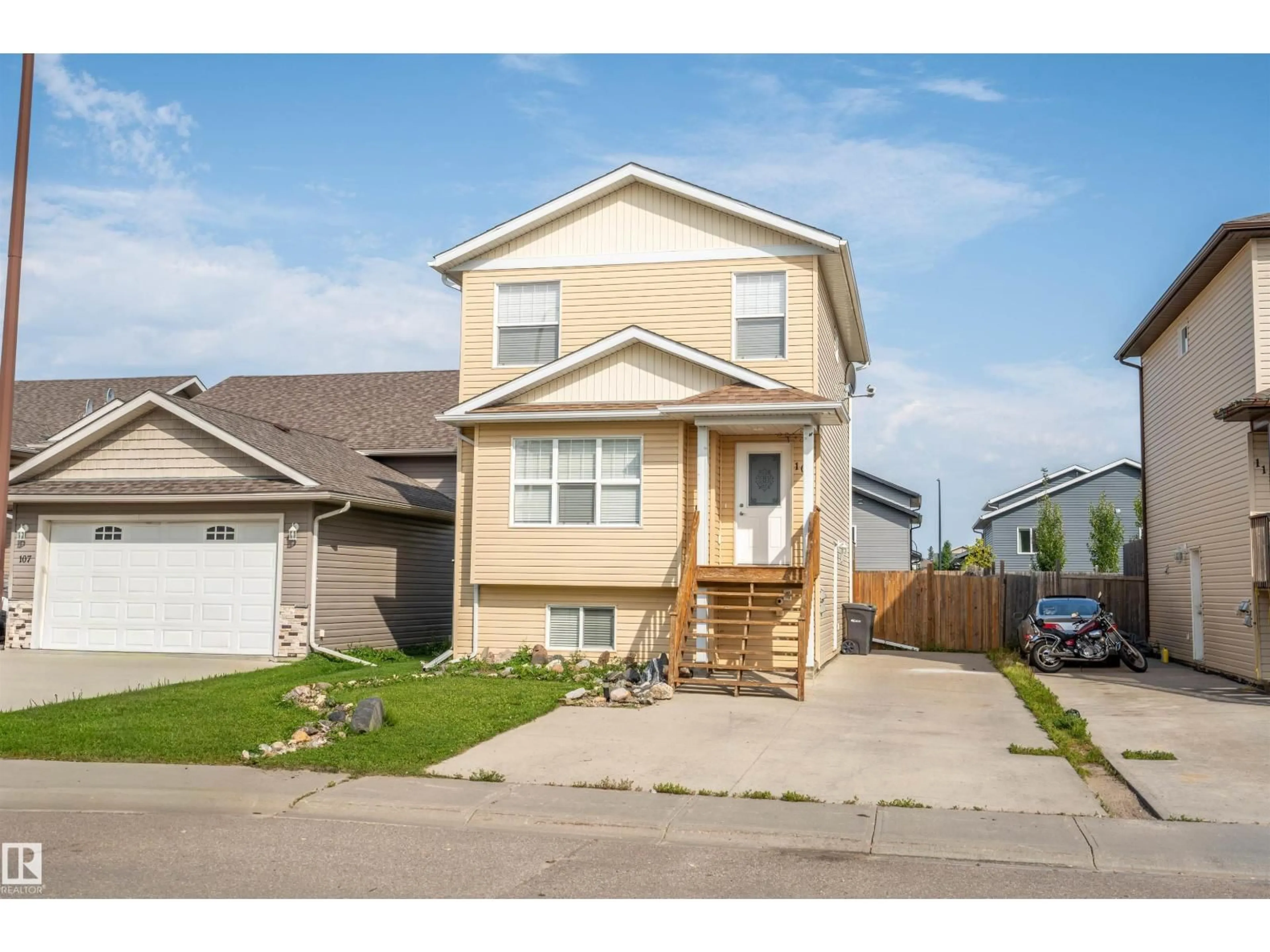 Home with vinyl exterior material, street for 109 26 ST, Cold Lake Alberta T9M0E3