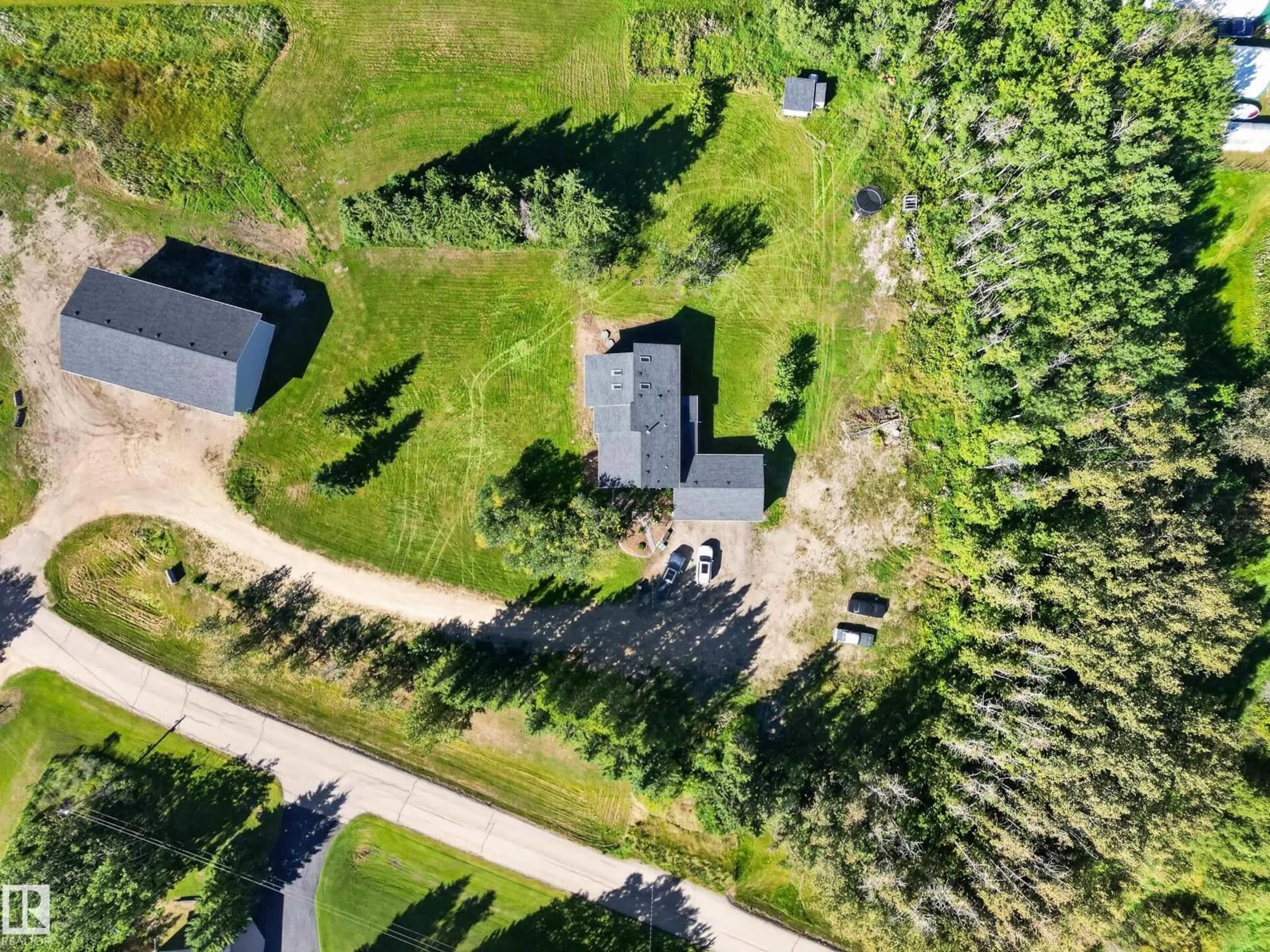 A pic from outside/outdoor area/front of a property/back of a property/a pic from drone, unknown for 52471 - 170 RGE ROAD 223 RGE ROAD, Rural Strathcona County Alberta T8A4P9