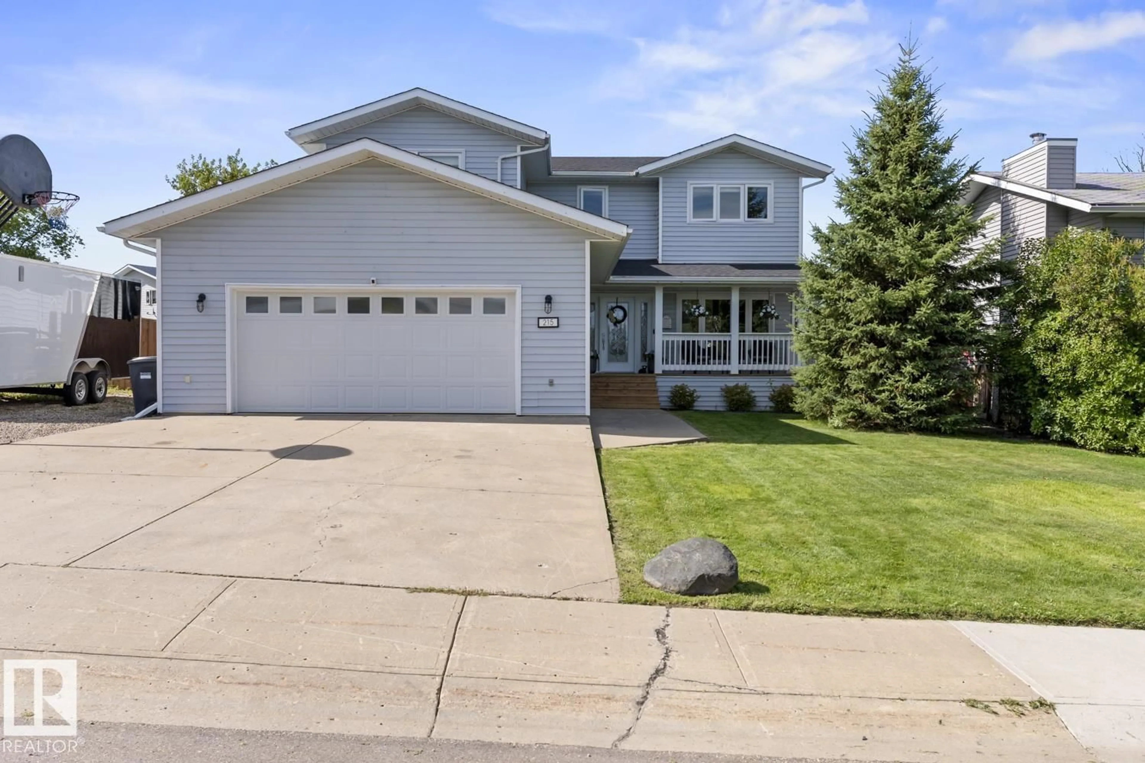 Home with vinyl exterior material, street for 215 18 ST, Cold Lake Alberta T9M1B6