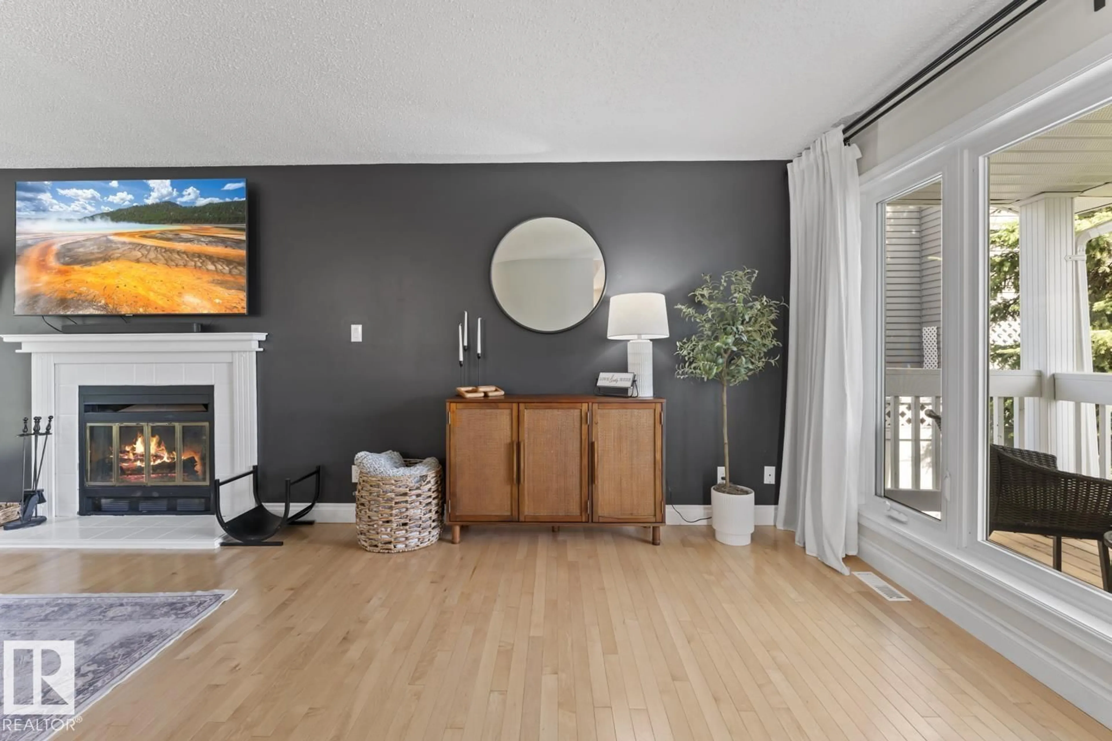 Living room with furniture, wood/laminate floor for 215 18 ST, Cold Lake Alberta T9M1B6