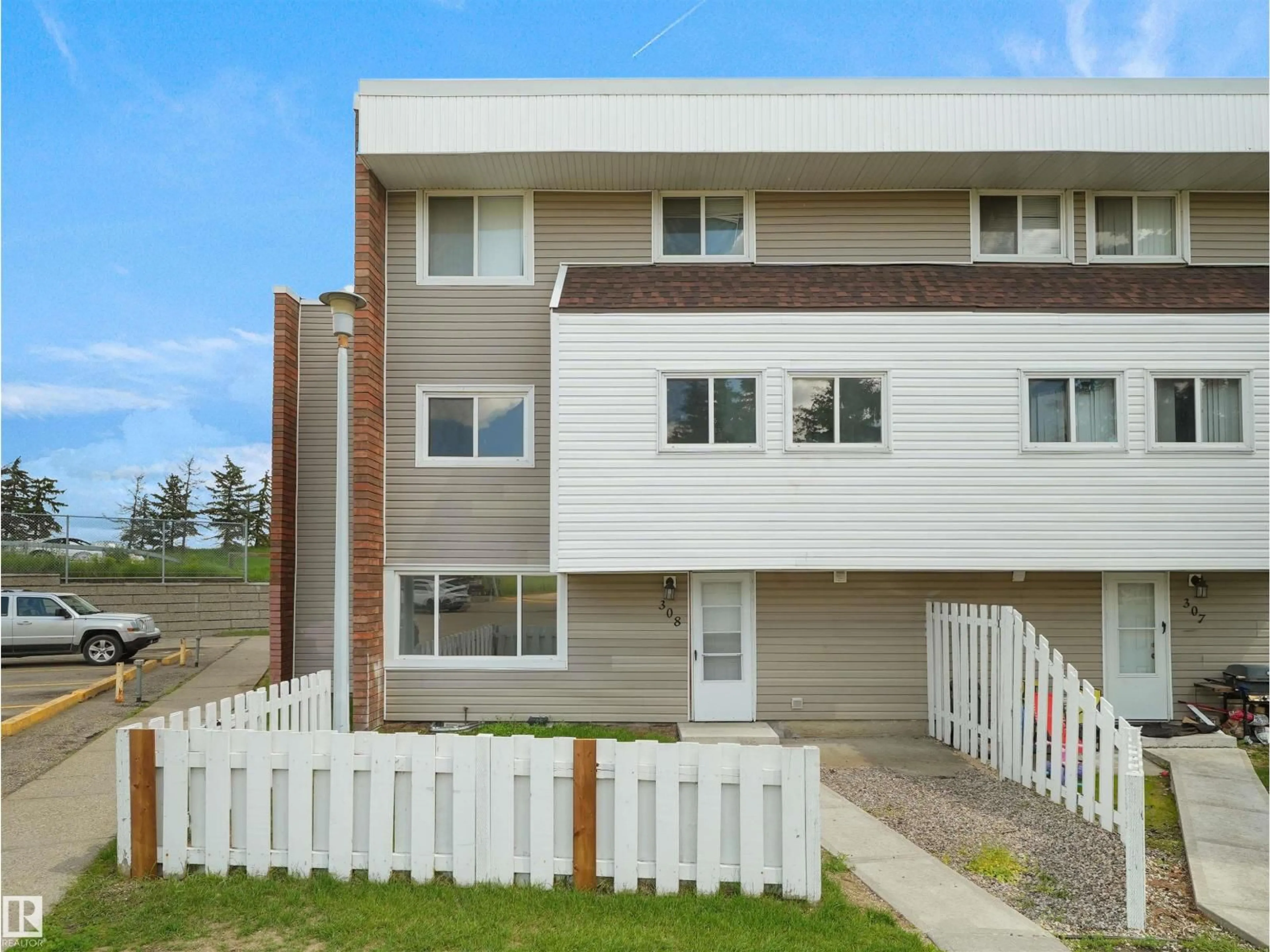 Home with vinyl exterior material, street for #308 - 2908 116A AV, Edmonton Alberta T5W4R7
