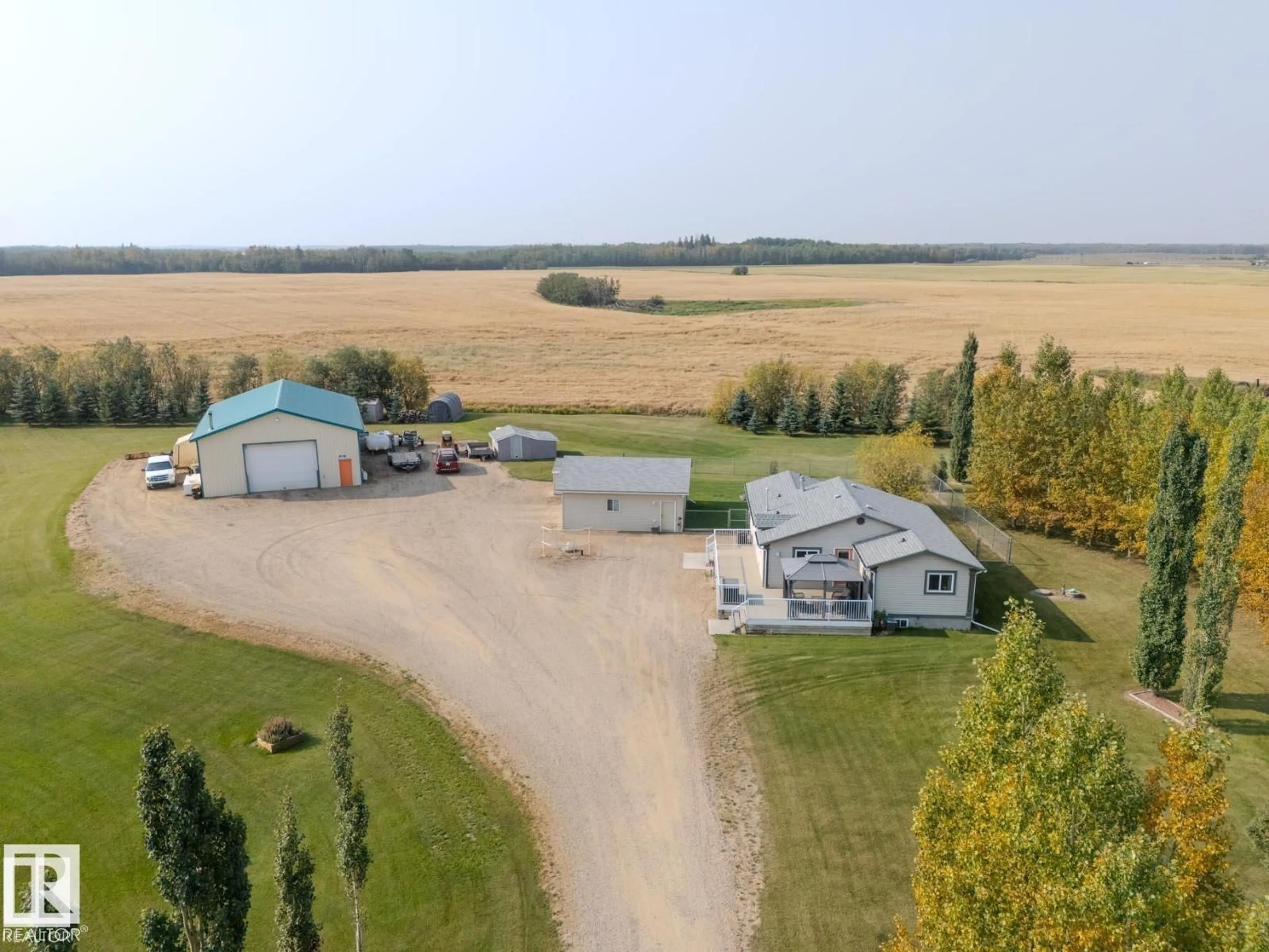 A pic from outside/outdoor area/front of a property/back of a property/a pic from drone, building for B - 23021 TWP ROAD 502, Rural Leduc County Alberta T0B3M1
