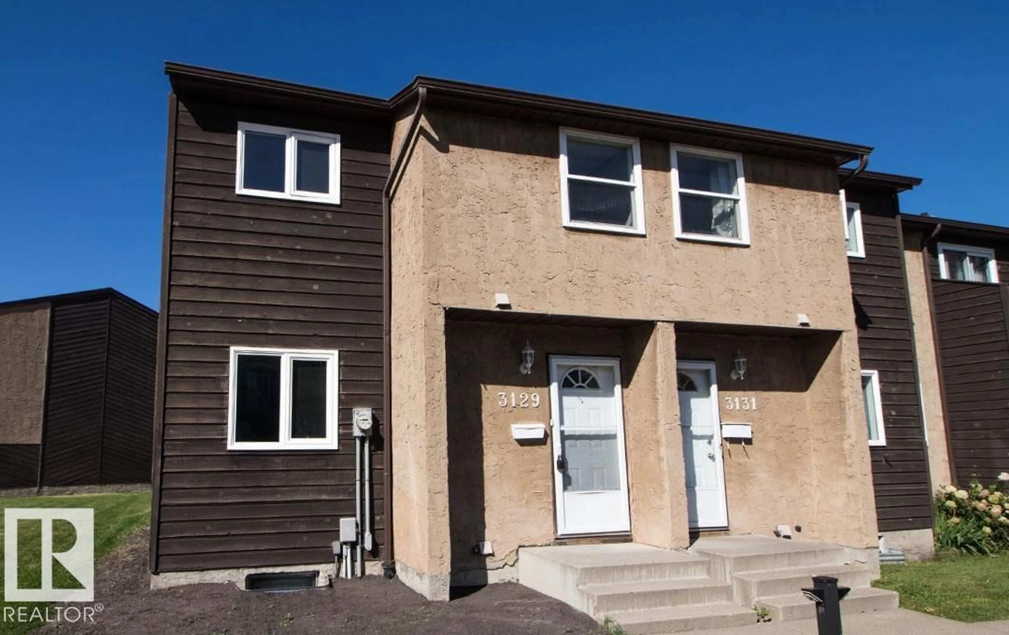 Home with vinyl exterior material, building for 3129 139 AV, Edmonton Alberta T5Y1R4