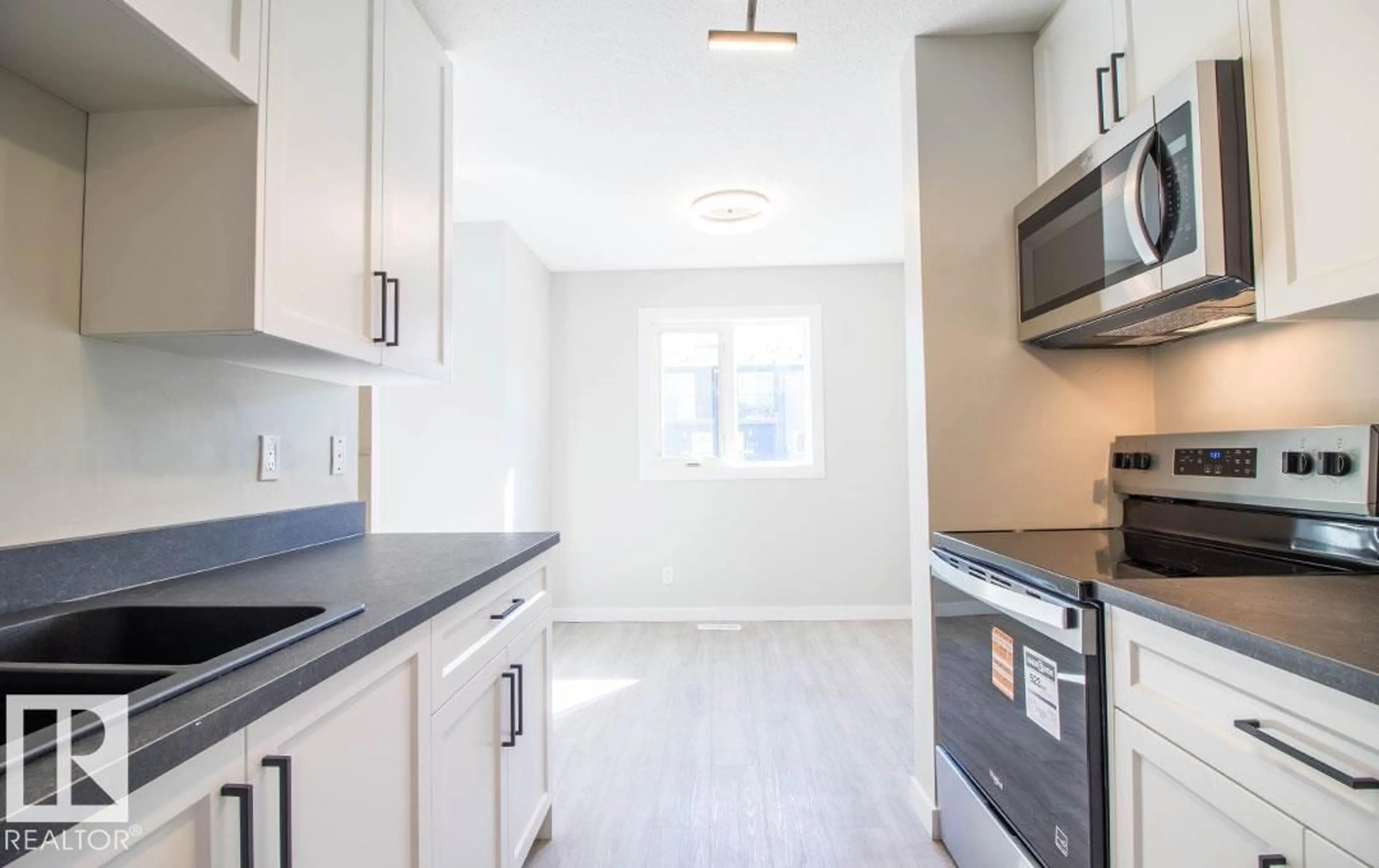 Standard kitchen, ceramic/tile floor for 3129 139 AV, Edmonton Alberta T5Y1R4