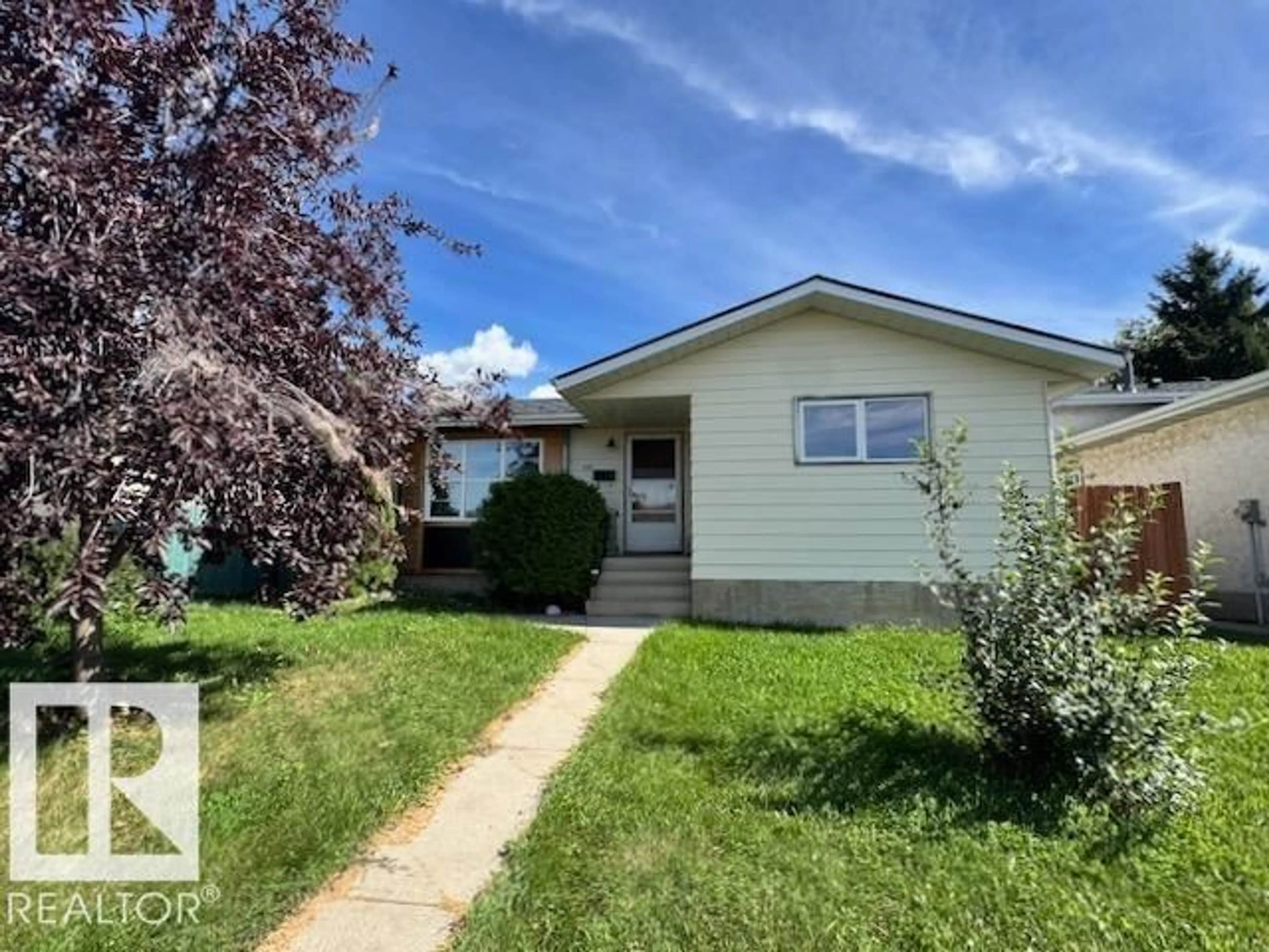 Home with vinyl exterior material, street for NW - 1715 38 ST, Edmonton Alberta T6L3H1