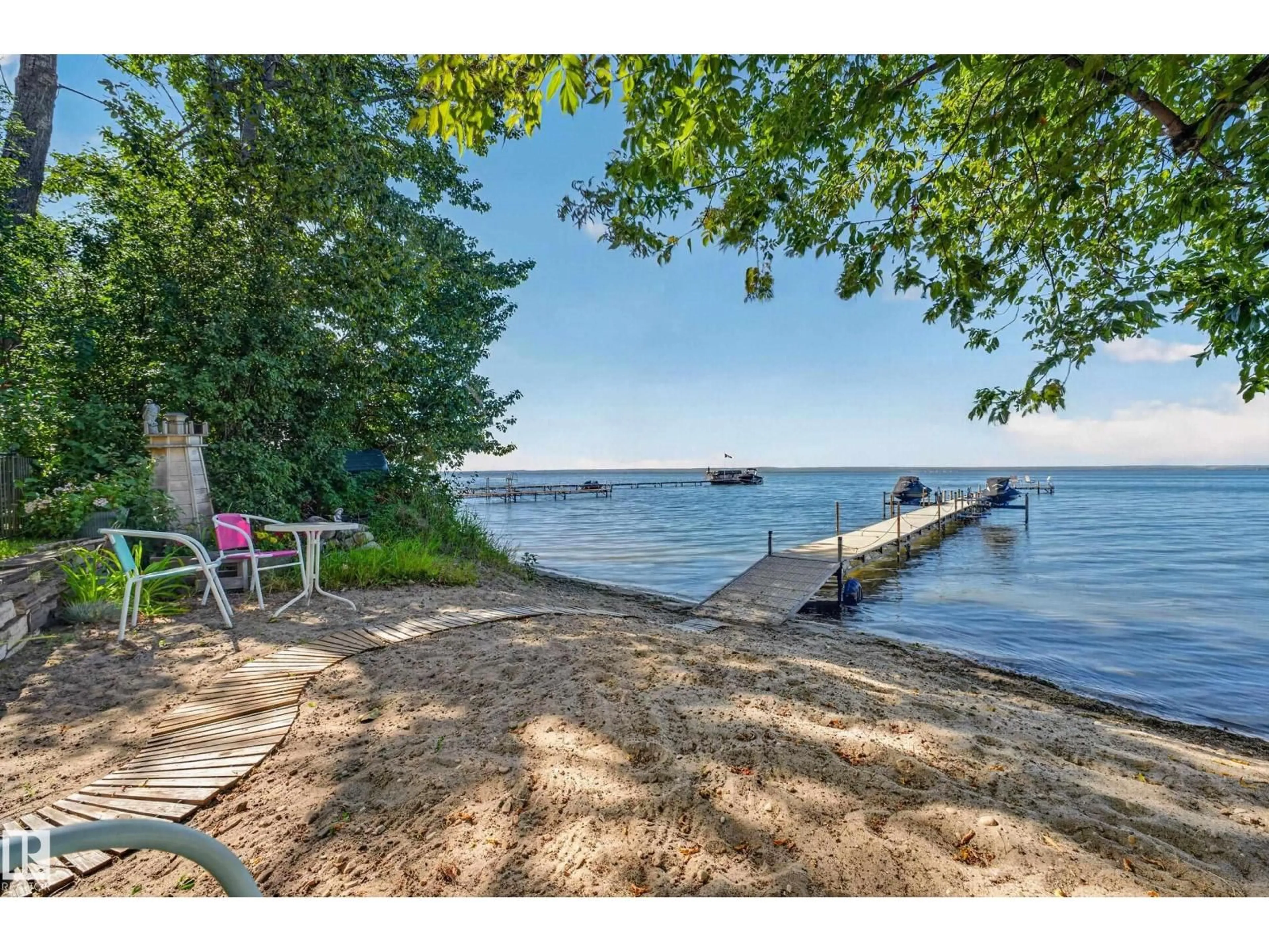 Patio, water/lake/river/ocean view for 51 ITASKA BEACH, Rural Leduc County Alberta T0C2P0