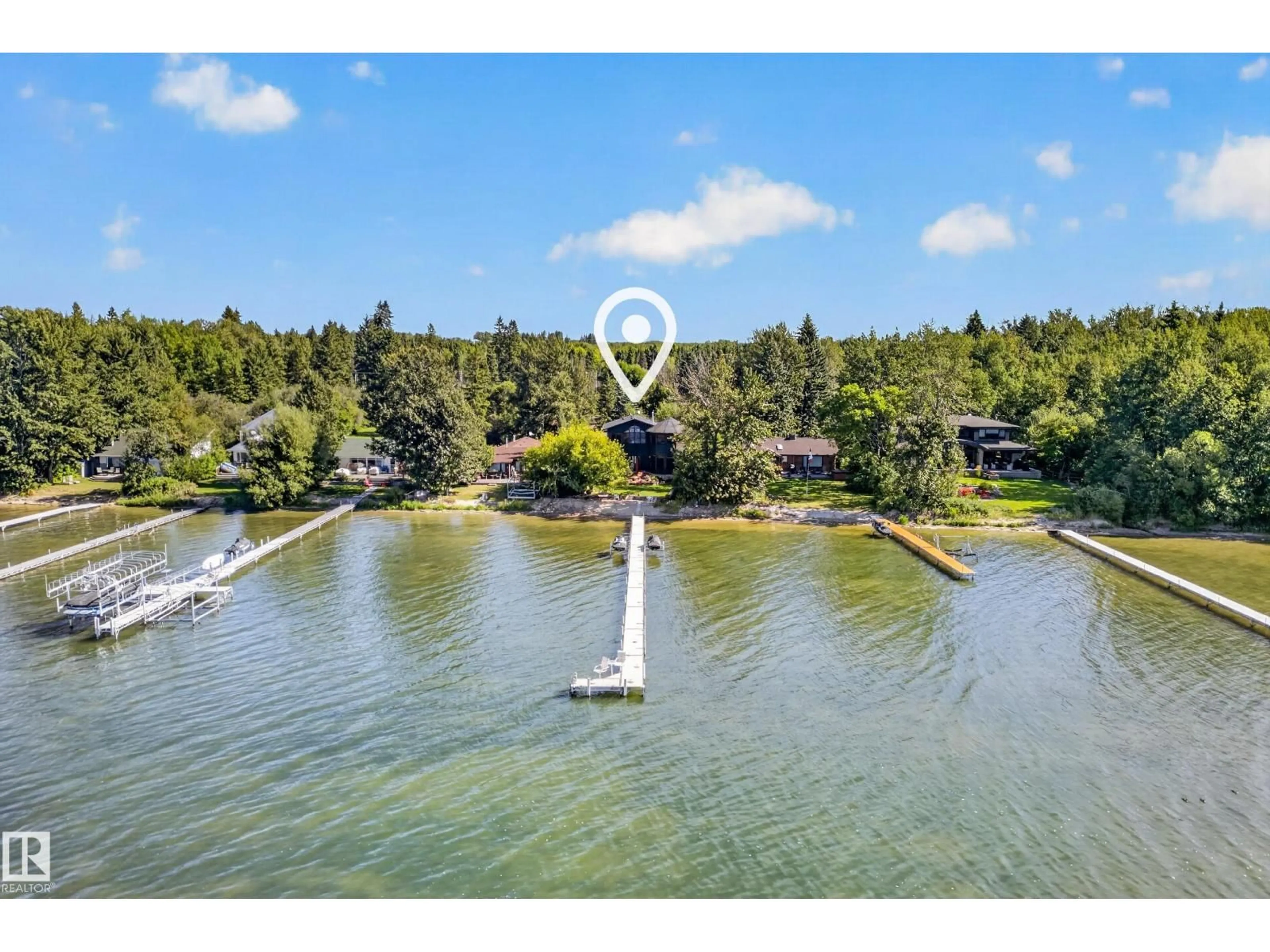 A pic from outside/outdoor area/front of a property/back of a property/a pic from drone, water/lake/river/ocean view for 51 ITASKA BEACH, Rural Leduc County Alberta T0C2P0