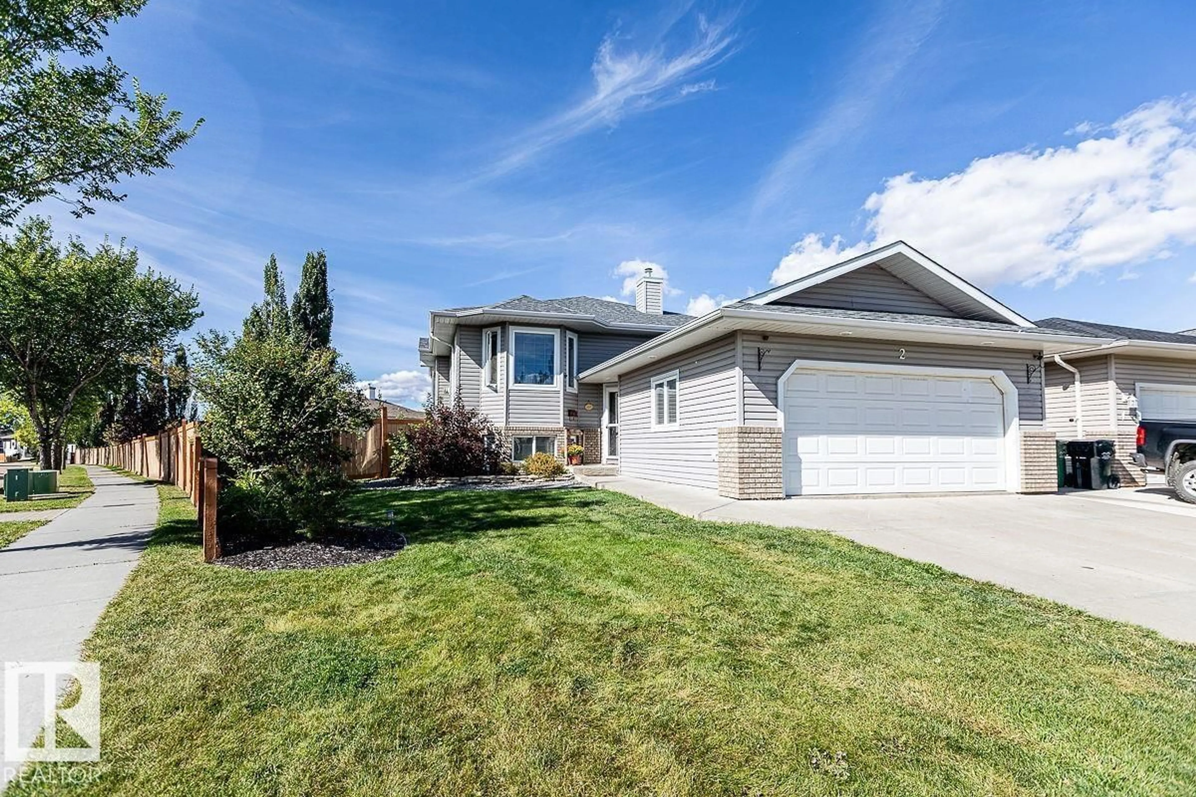 Home with vinyl exterior material, street for 2 WOODS PL, Leduc Alberta T9E8T1