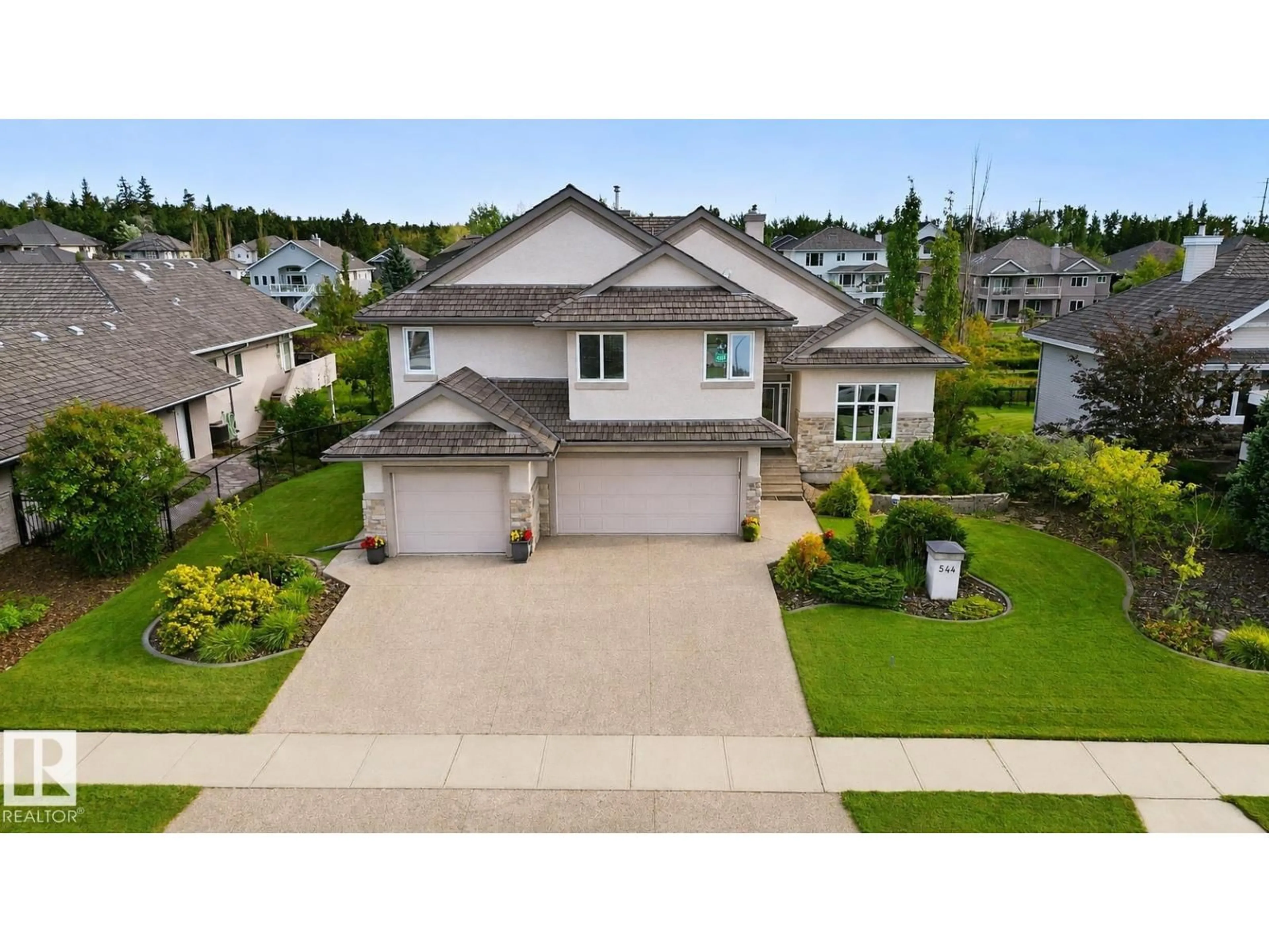 A pic from outside/outdoor area/front of a property/back of a property/a pic from drone, street for 52304 - 544 RGE ROAD 233, Rural Strathcona County Alberta T8B1C9