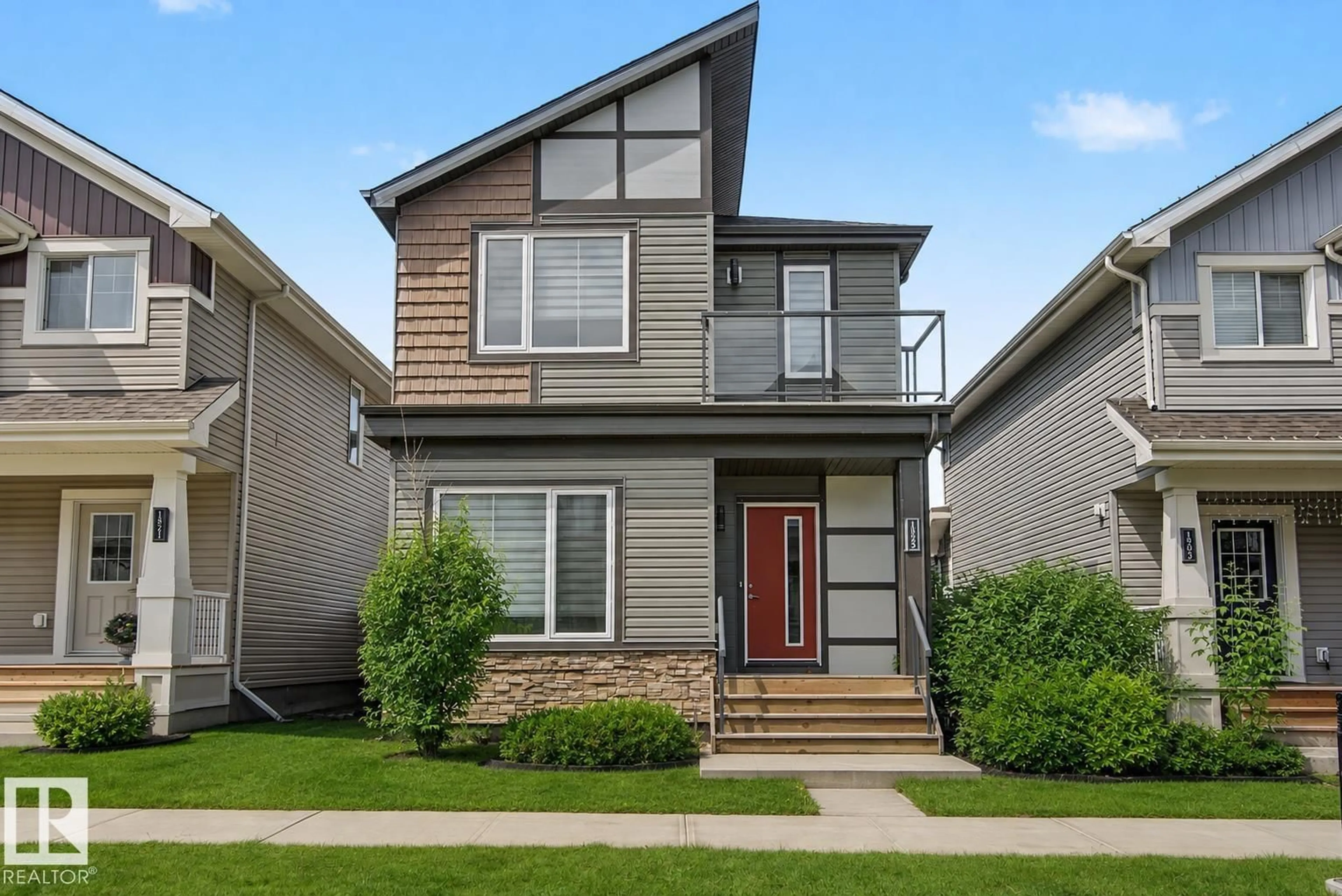 Home with vinyl exterior material, street for 1825 25A ST, Edmonton Alberta T6T2H7