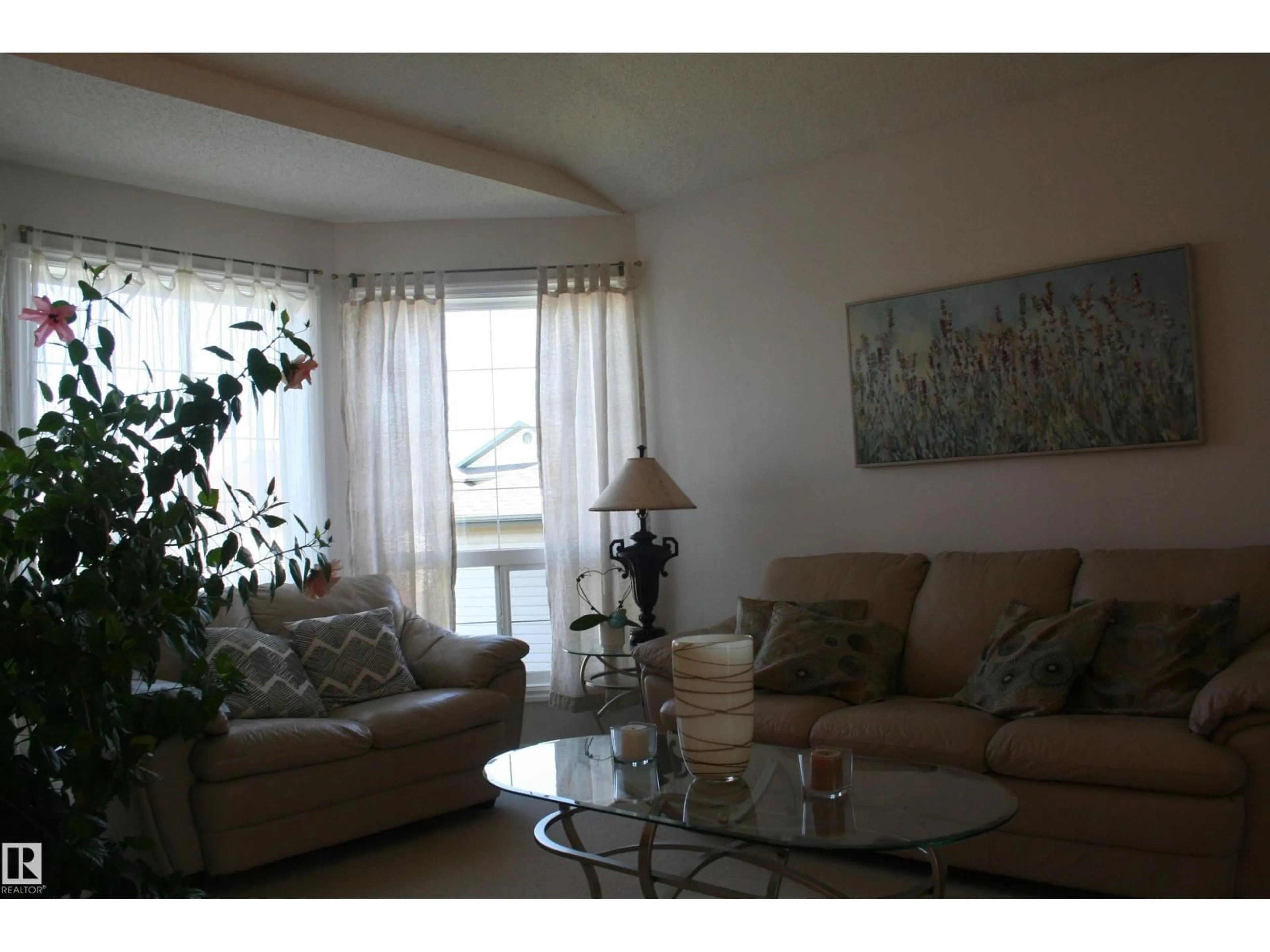 Living room with furniture, wood/laminate floor for 263 DUNVEGAN RD, Edmonton Alberta T5L5E5