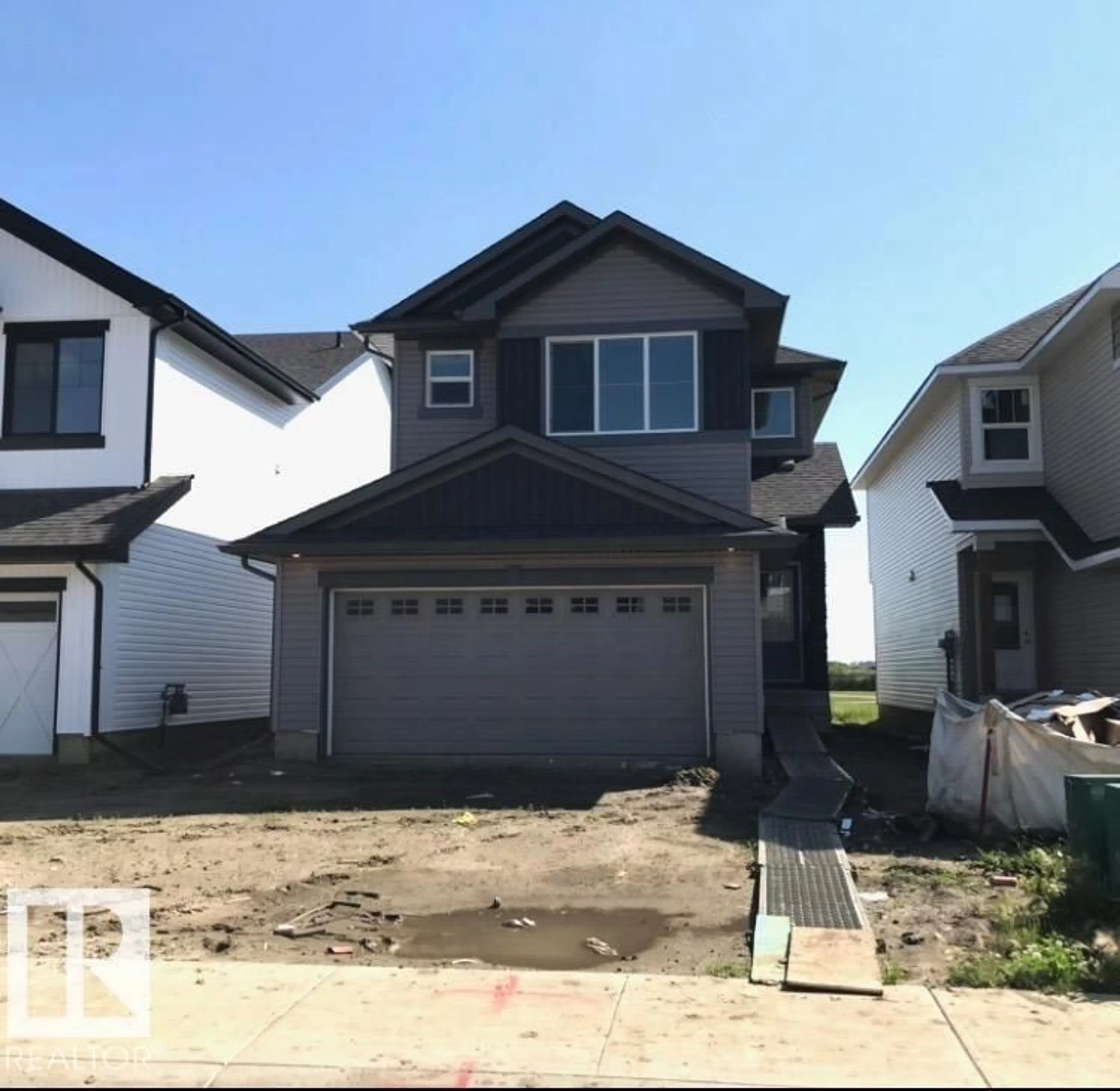 Home with vinyl exterior material, street for 1179 SOUTH CREEK WD, Stony Plain Alberta T7Z0J9