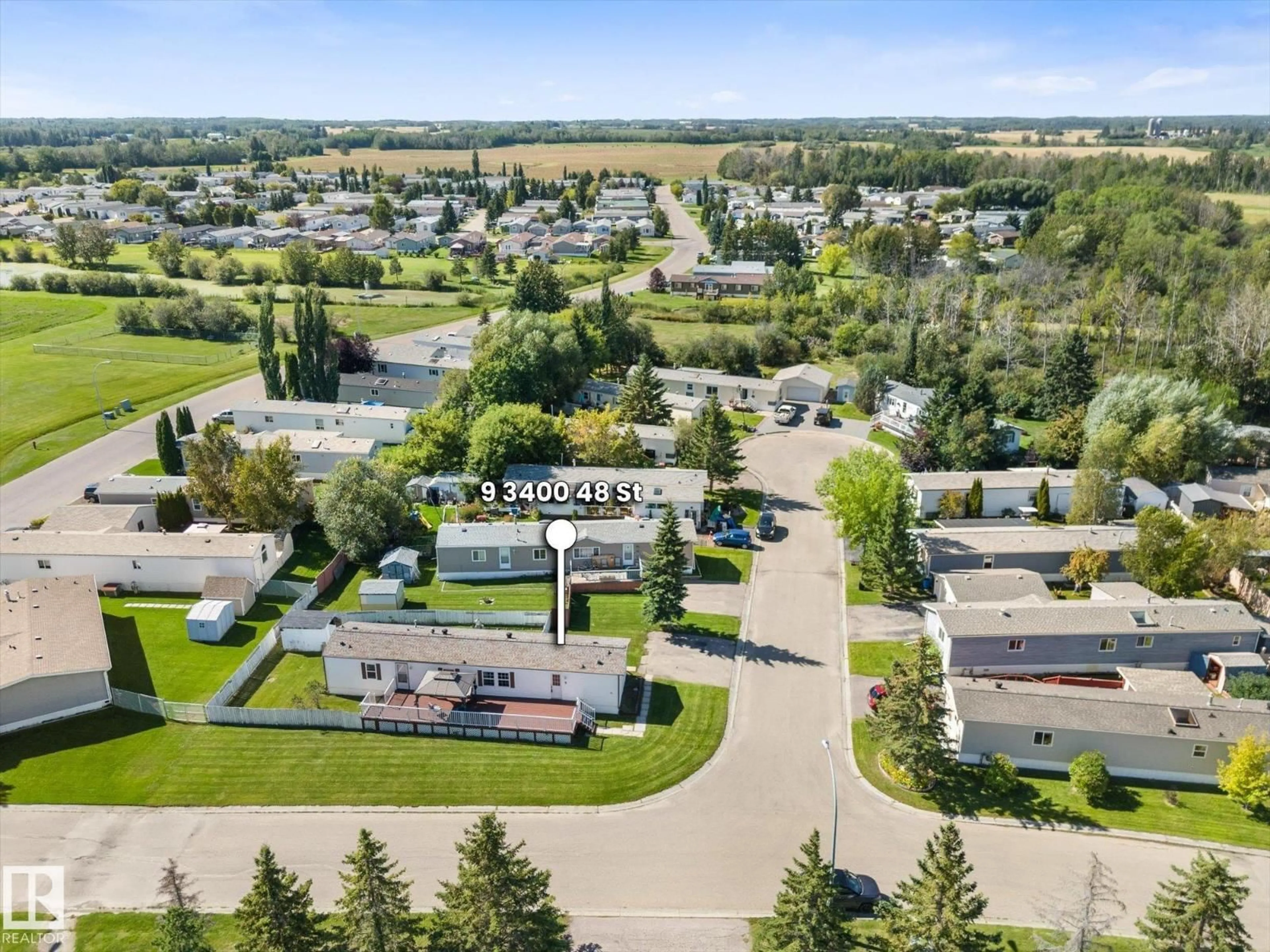 A pic from outside/outdoor area/front of a property/back of a property/a pic from drone, street for 9 - 3400 48 ST, Stony Plain Alberta T7Z1R9