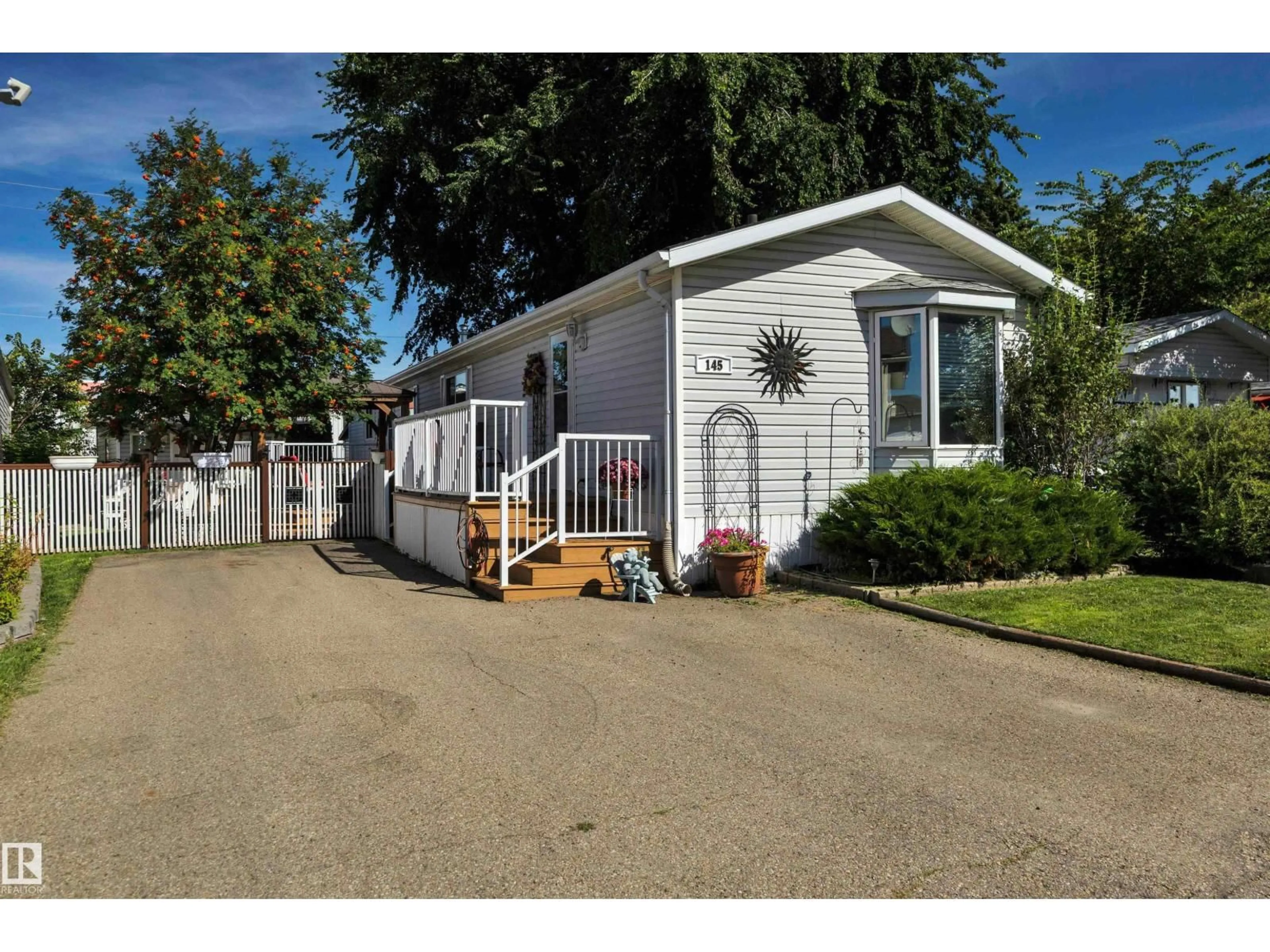 Home with vinyl exterior material, street for 145 WILLOW PARK ESTATE, Leduc Alberta T9E6J7
