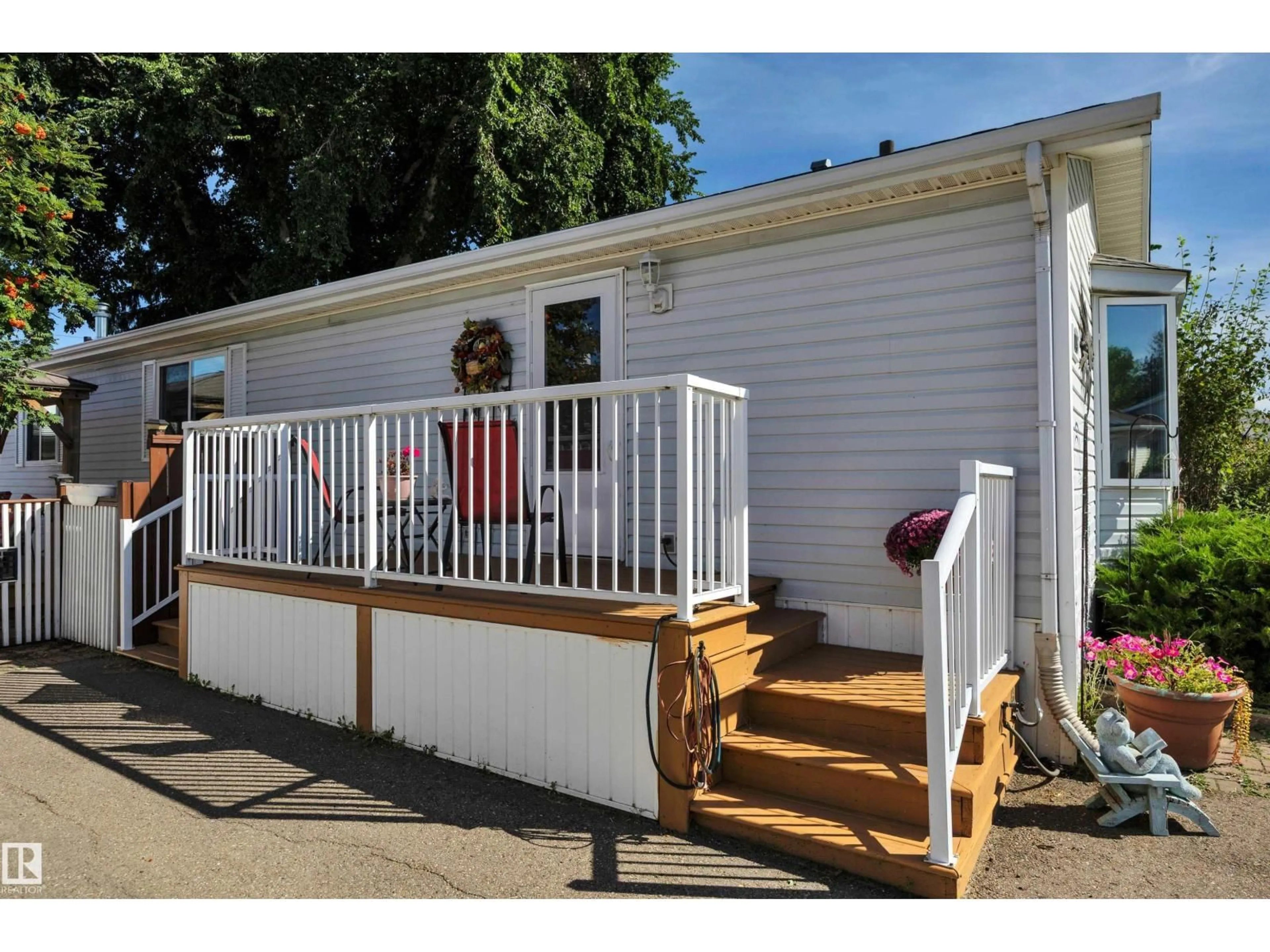 Home with vinyl exterior material, street for 145 WILLOW PARK ESTATE, Leduc Alberta T9E6J7