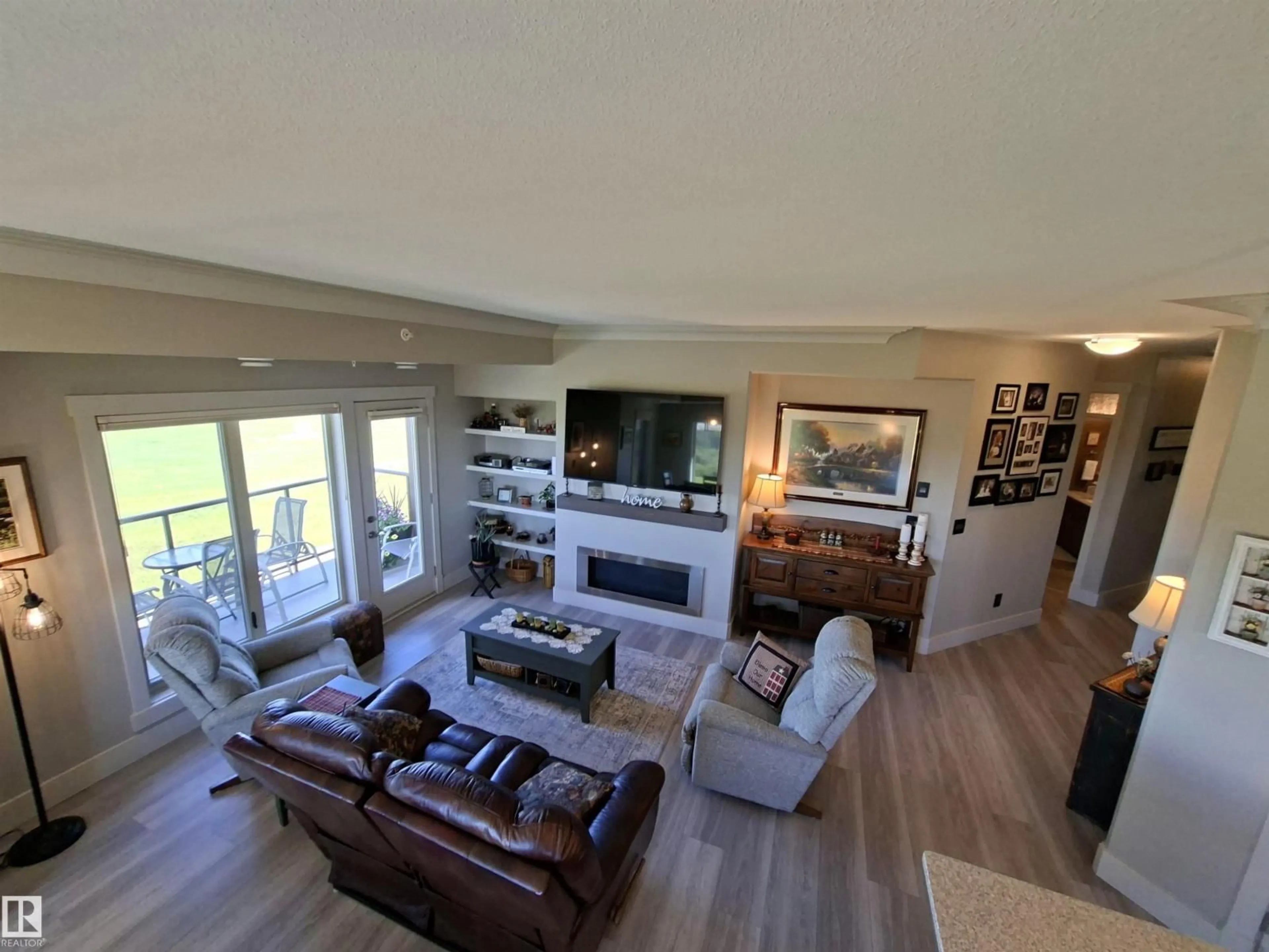 Living room with furniture, unknown for #401 - 5201 BROUGHTAM DR, Drayton Valley Alberta T7A0C8